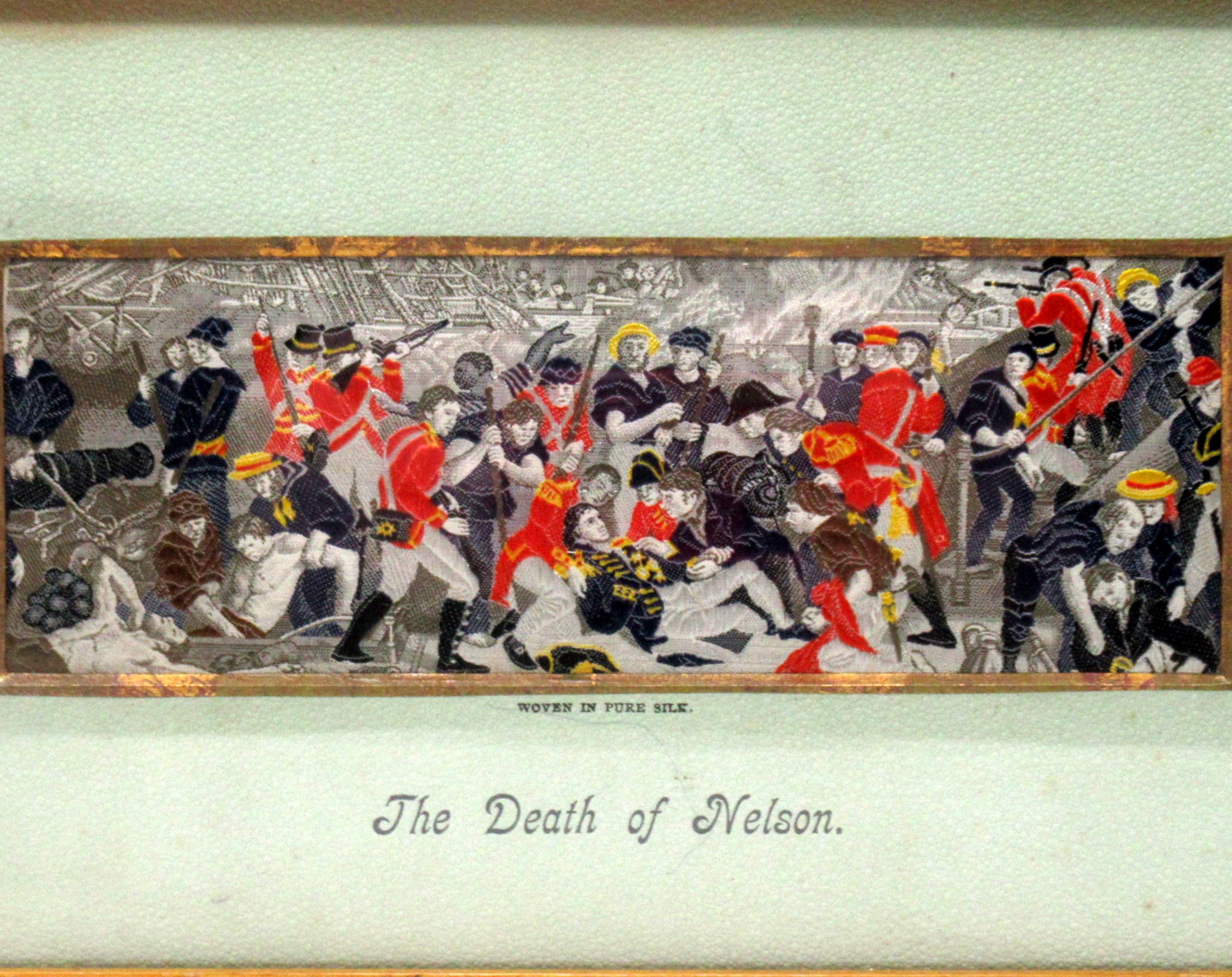 This is a beautifully framed Stevengraph - Handwoven Silk of a view of the death of Admiral Lord Nelson on the deck of the flagship Victory in 1805. This picture is very crowded with figures and is larger than the normal Stevengraph. The colours are