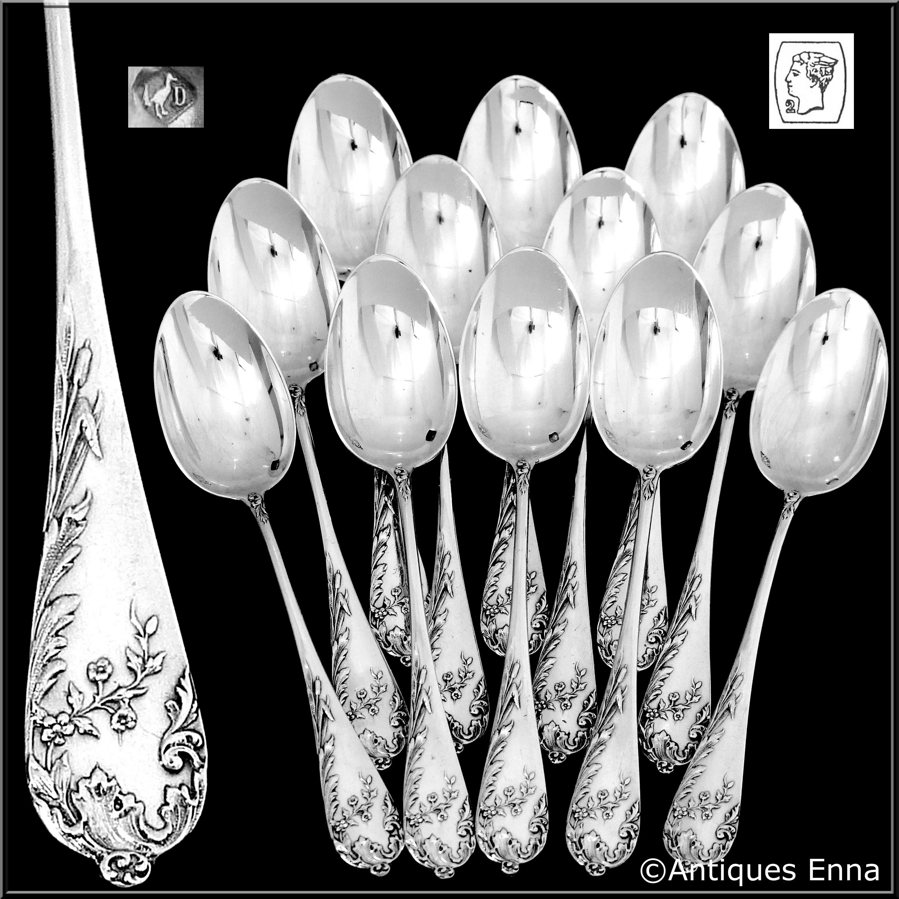 Head of Mercure 2nd titre for 800/1000 French sterling silver guarantee.

Antique French sterling silver tea coffee spoons set twelve pieces with fantastic reed decoration in the Art Nouveau style. No monograms. Gorgeous model of the prestigious