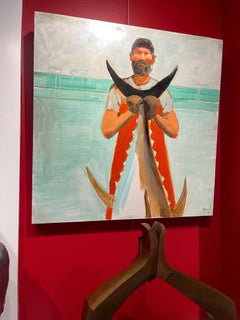 "Fresh" bearded fisherman holding fish