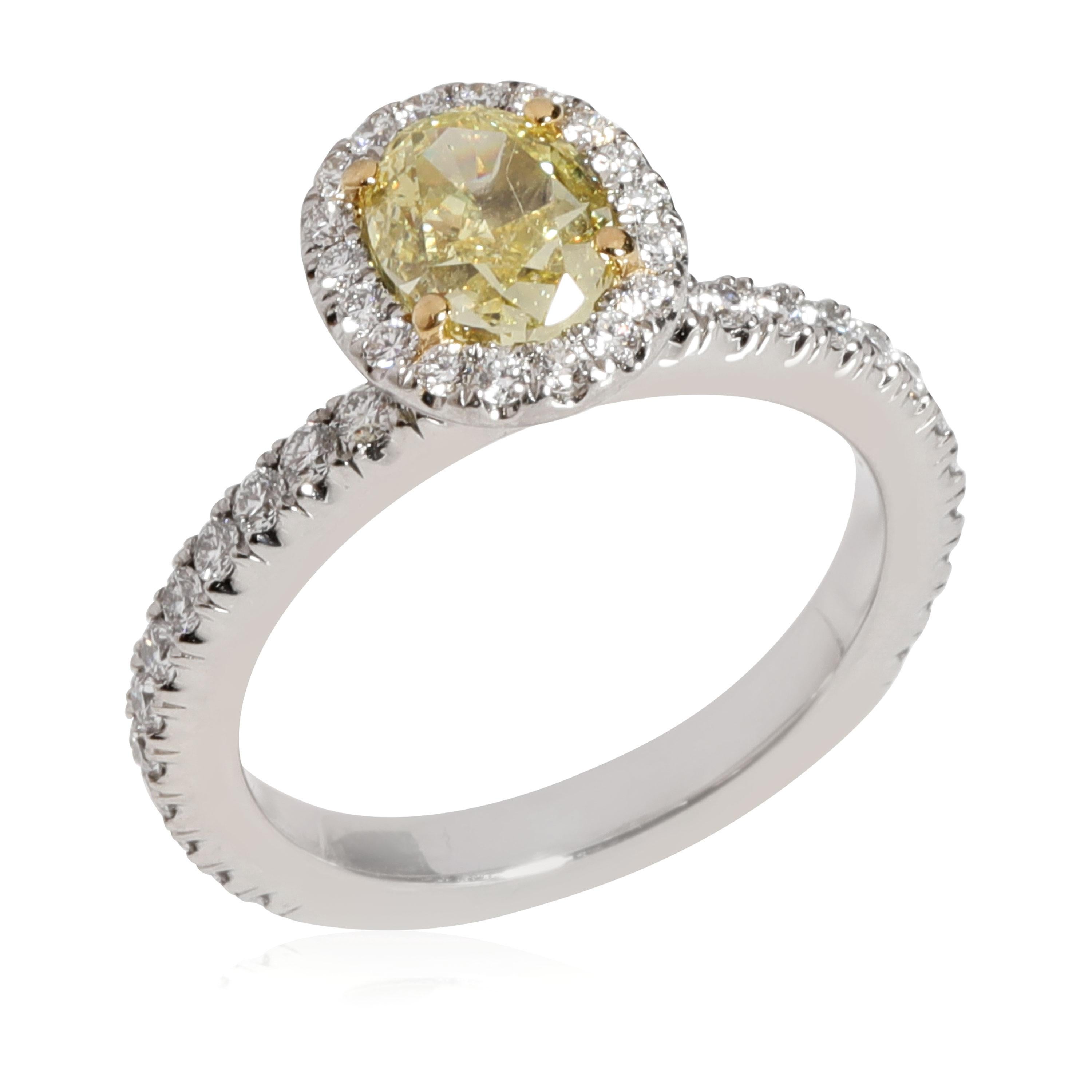 Oval Cut Debeers Fancy Yellow Diamond Engagement Ring in Platinum VS1 0.90 CTW