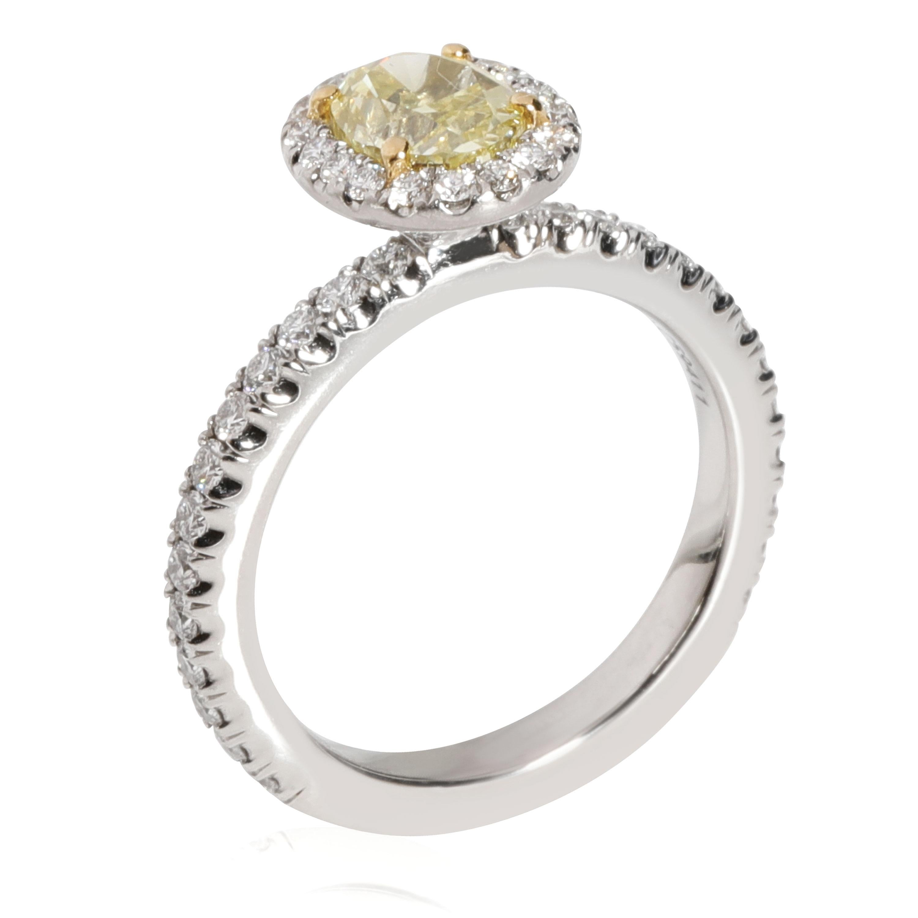 Debeers Fancy Yellow Diamond Engagement Ring in Platinum VS1 0.90 CTW In Excellent Condition In New York, NY