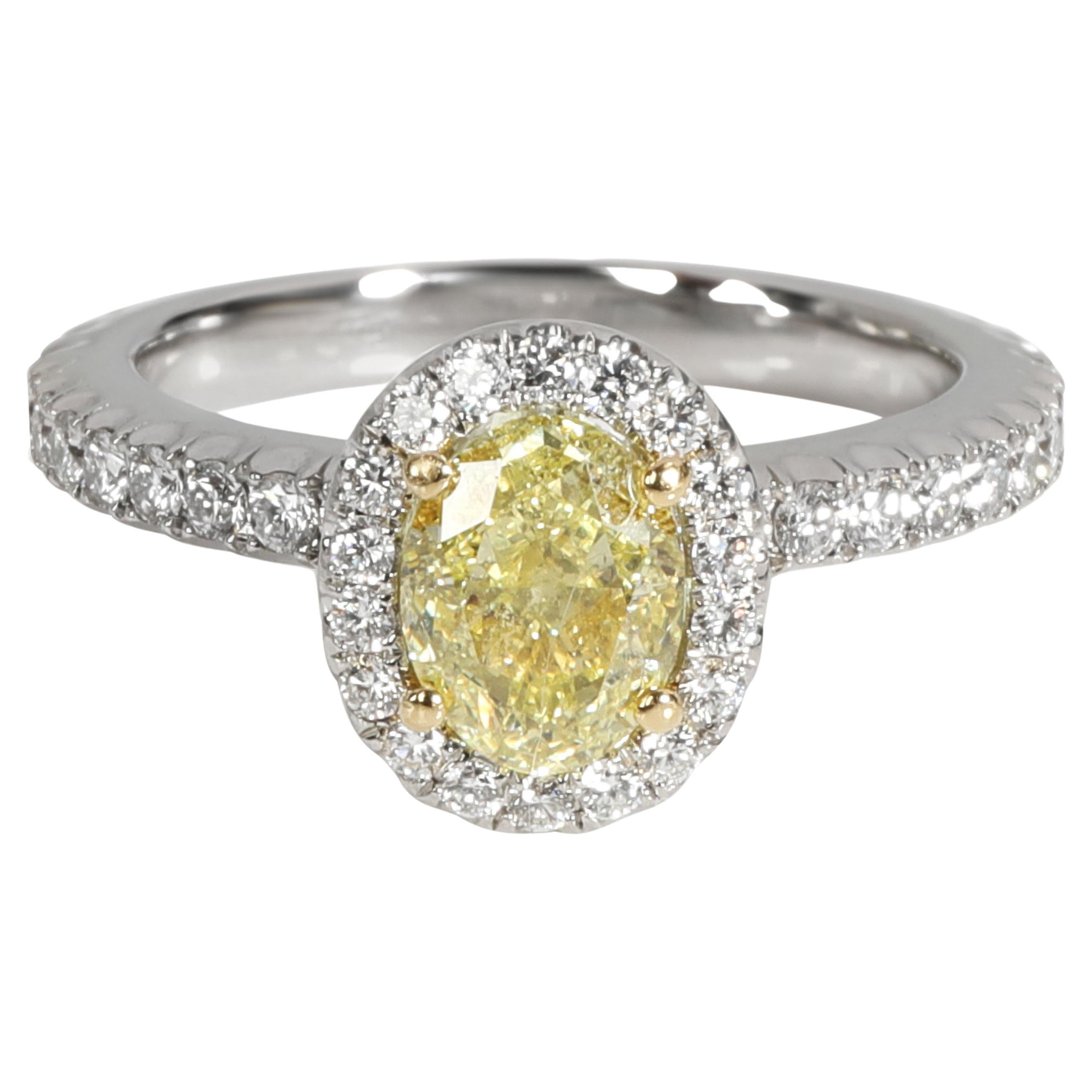 Debeers Fancy Yellow Diamond Engagement Ring in Platinum VS1 0.90 CTW