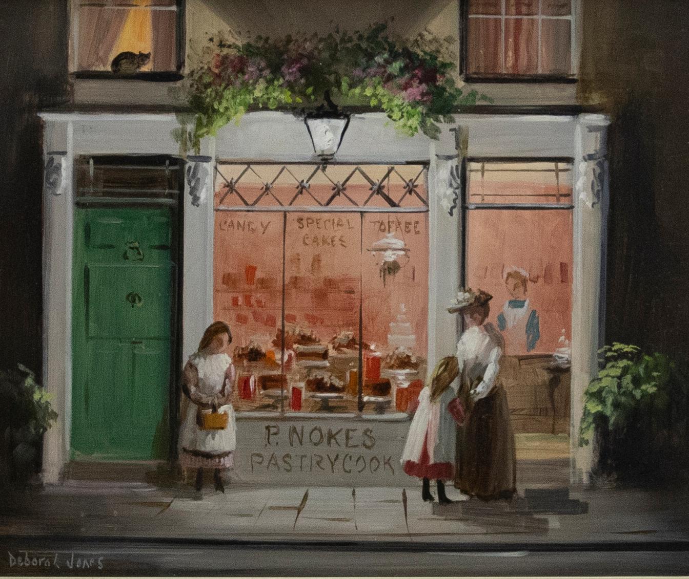 A charming 20th century street scene in oil, showing an Edwardian pastry shop with magnificent window display. Figures can be seen waiting at the door deliberating the many choices of cake and candy. The painting has been well-presented in an