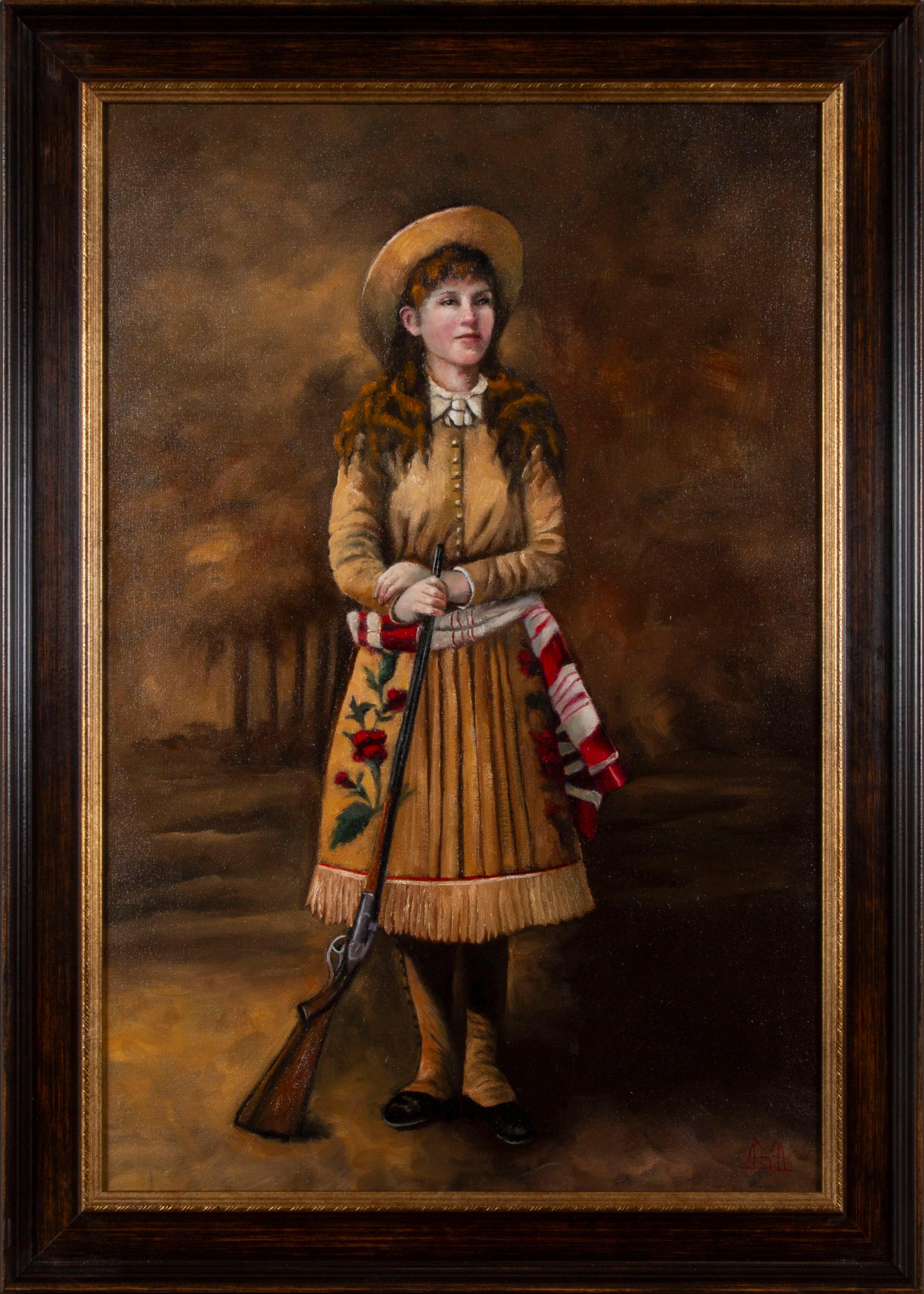 "Annie Gets Her Gun" von Deborah McKenna, original Öl auf Leinwand, 30" x 20", 35" x 25" in einem Massivholzrahmen.

Annie Oakley (geboren als Phoebe Ann Mosey; 13. August 1860 - 3. November 1926) war eine amerikanische Scharfschützin, die in