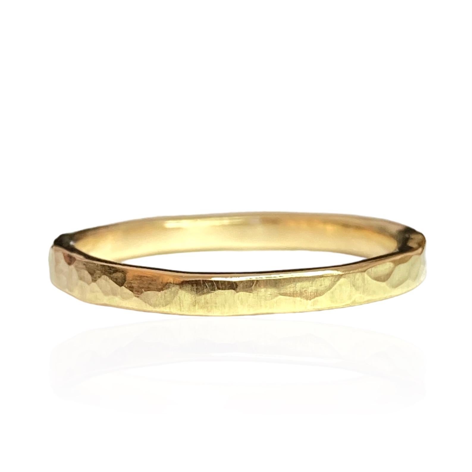 18kt Yellow Gold Textured Ring by Deborah Murdoch. This ring band is slightly planished giving that textural feel and has a silky satin finish. Each ring is hammered by hand to give an organic texture making each ring one of a kind.

    Metal: 18kt