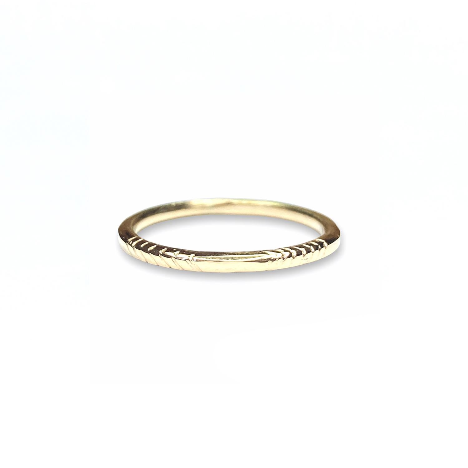 18 Karat Yellow Gold Twine Ring by Deborah Murdoch is part of the Ingrain Collection. The ring band has engraved lines on either side and comes in a polished finish.

Metal: 18 Karat Yellow Gold 
Ring Band Dimensions: Thickness 1.6mm
Ring Size: Made