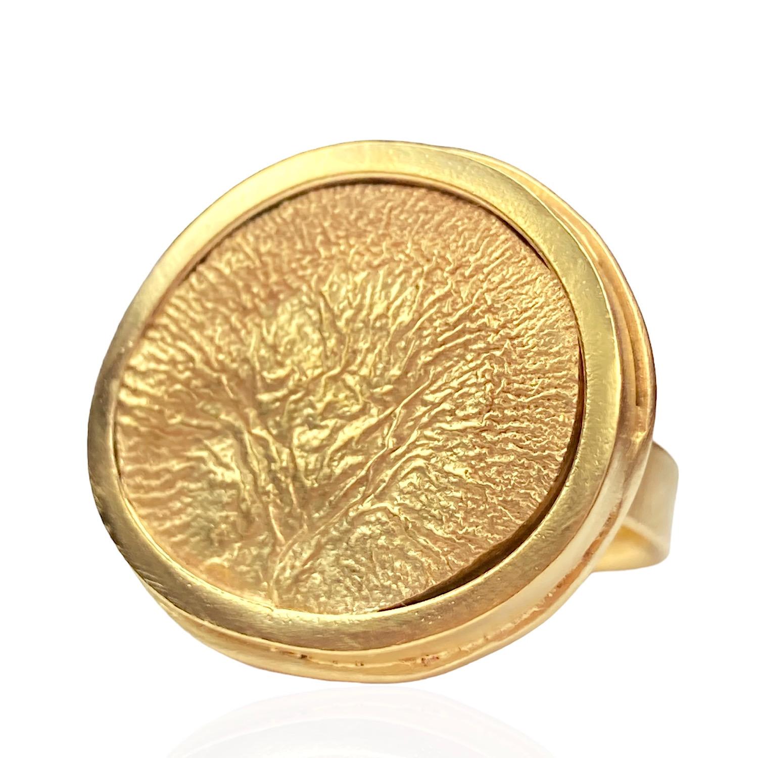 Tree Of Life Ring by Deborah Murdoch. This ring has been made by hand using the reticulation method, making it one of a kind.

    Metal: Gold vermeil over sterling silver
    Stone Dimensions : 26X23mm
    Ring Band Dimensions: Thickness 4mm
    In