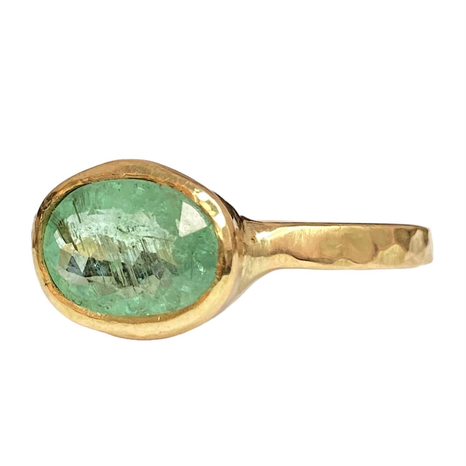 One of a kind 18kt Yellow Gold Ring by Deborah Murdoch is from the Abundance Collection featuring an oval 2.0ct Green Paraiba Stone. The ring band is slightly planished giving that textural feel and has a silky satin finish.

Paraiba stones have