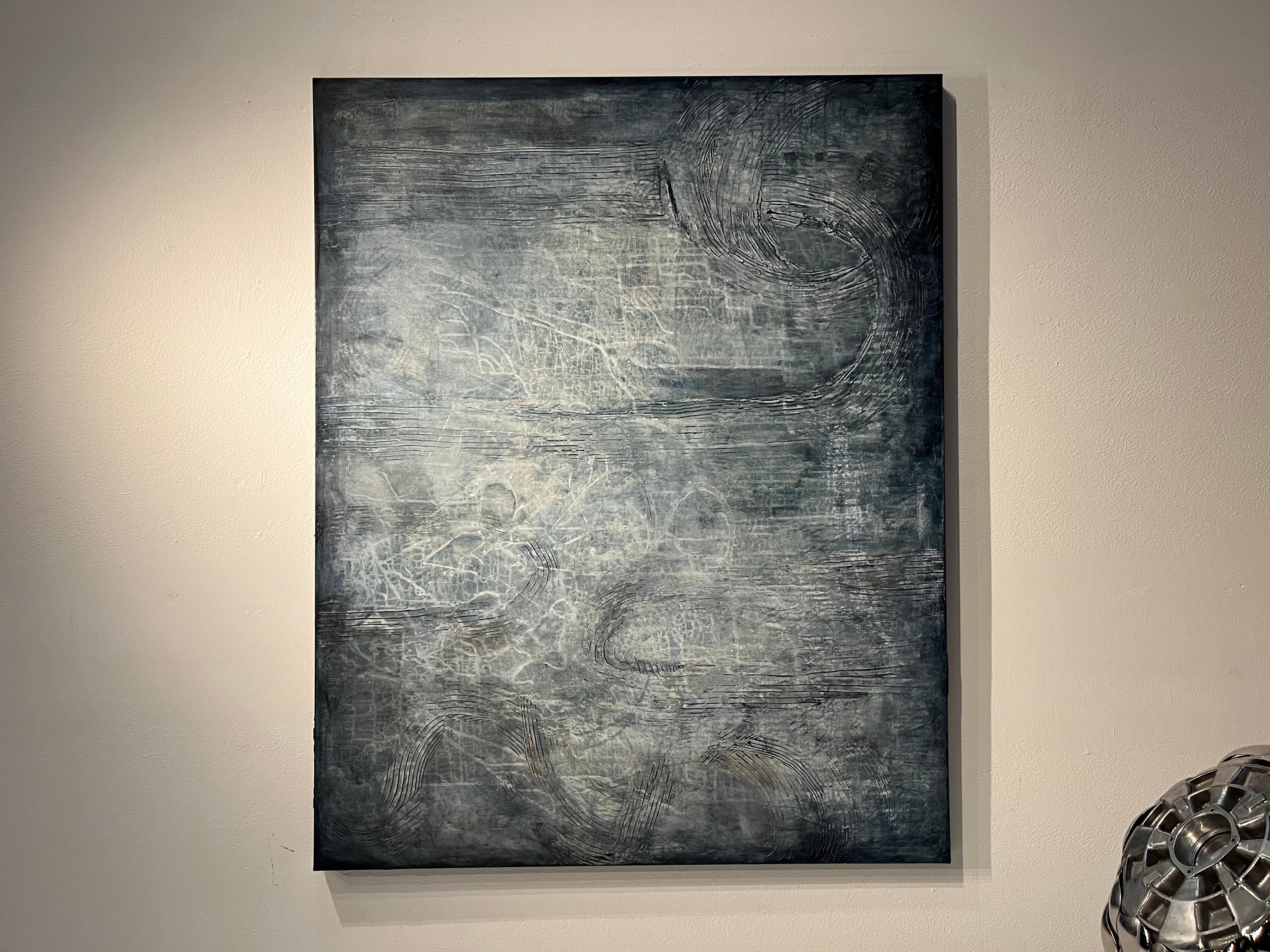 Onde is a beautiful texured abstract painting with blue and silvery gray tones. Heavily textured with plaster and acrylic paint.