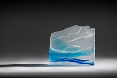 Moving fast, kilnformed, hand polished glass sculpture by Debra Jurss