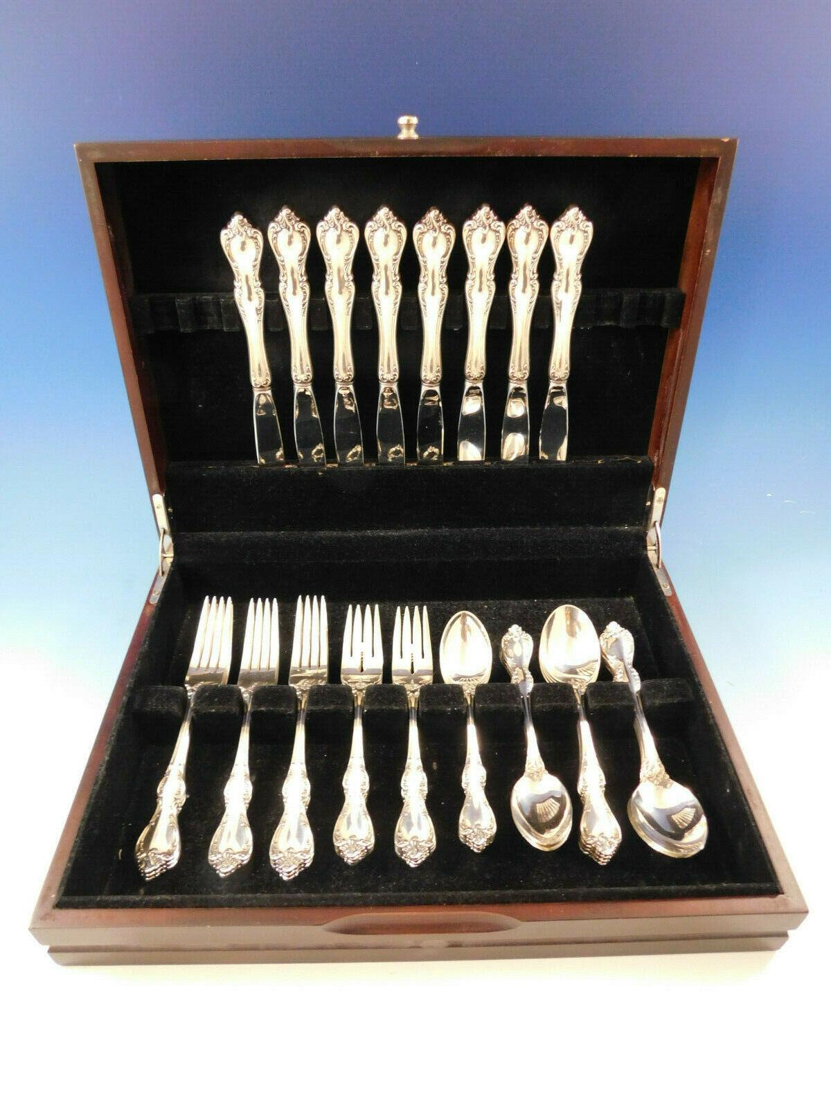 Debussy by Towle sterling silver flatware set, 40 pieces. This set includes:

 8 knives, 9