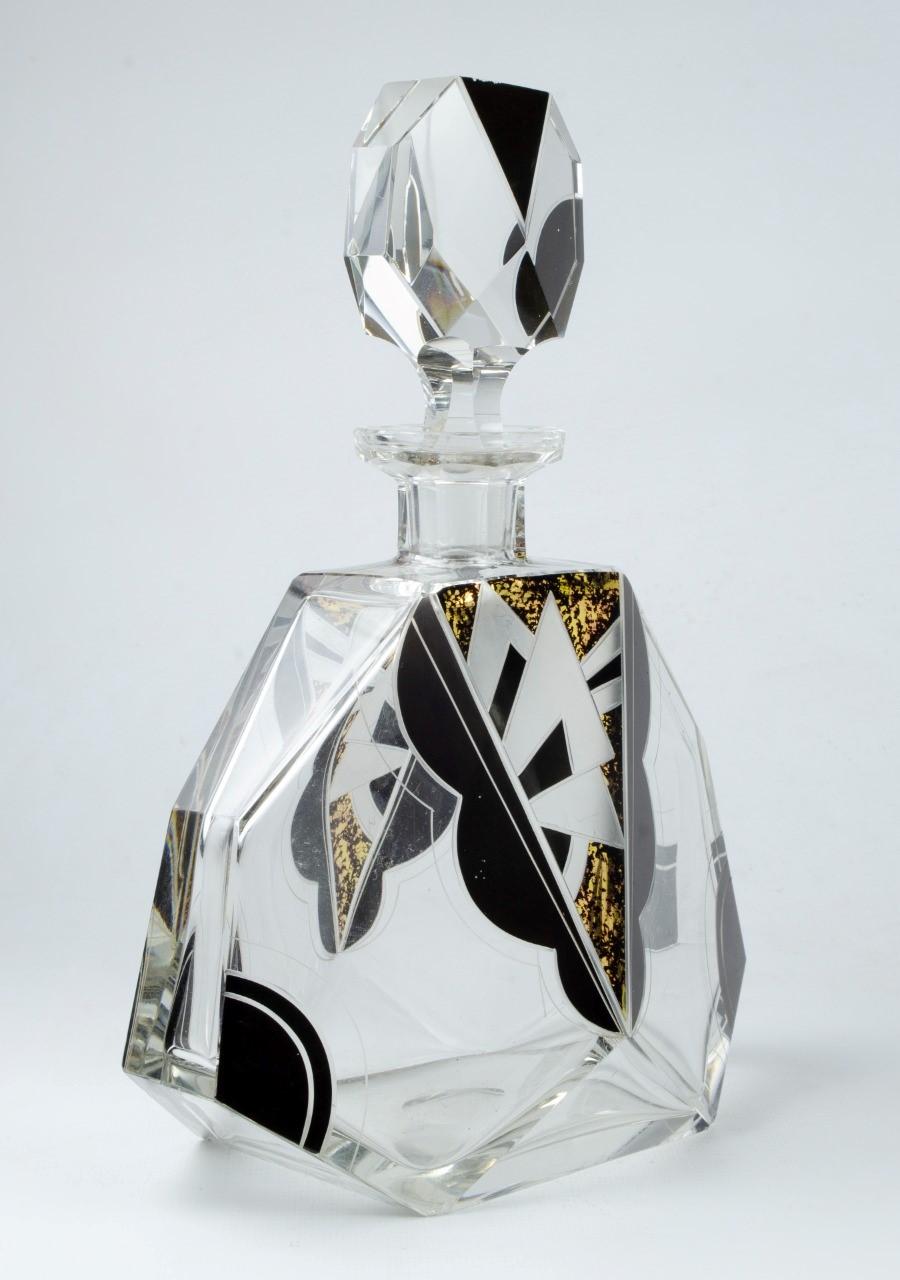 Decadent Art Deco Czech crystal and enamel Bohemian bottle 1930s
Perfect condition
oversized Czech crystal Art Deco flacon with black enamel geometric pattern
Perfect size for either cologne or liqueur
A superbly stylish weighty decanter and