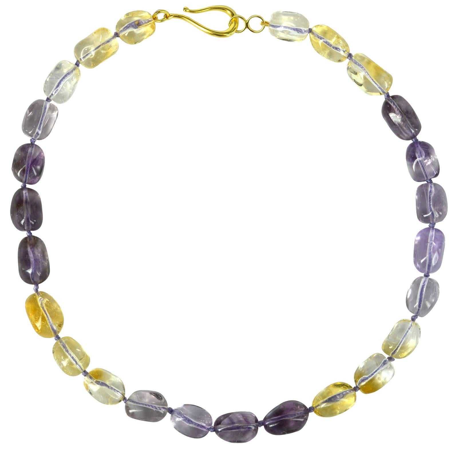 Shaded Amethyst and Citrine polished nuggets approx 16x12mm with a 40mm Gold Plate Sterling Silver hook Clasp, hand knotted for strength and durability.

Finished necklace measures 49.5cm.

Custom modification available on request