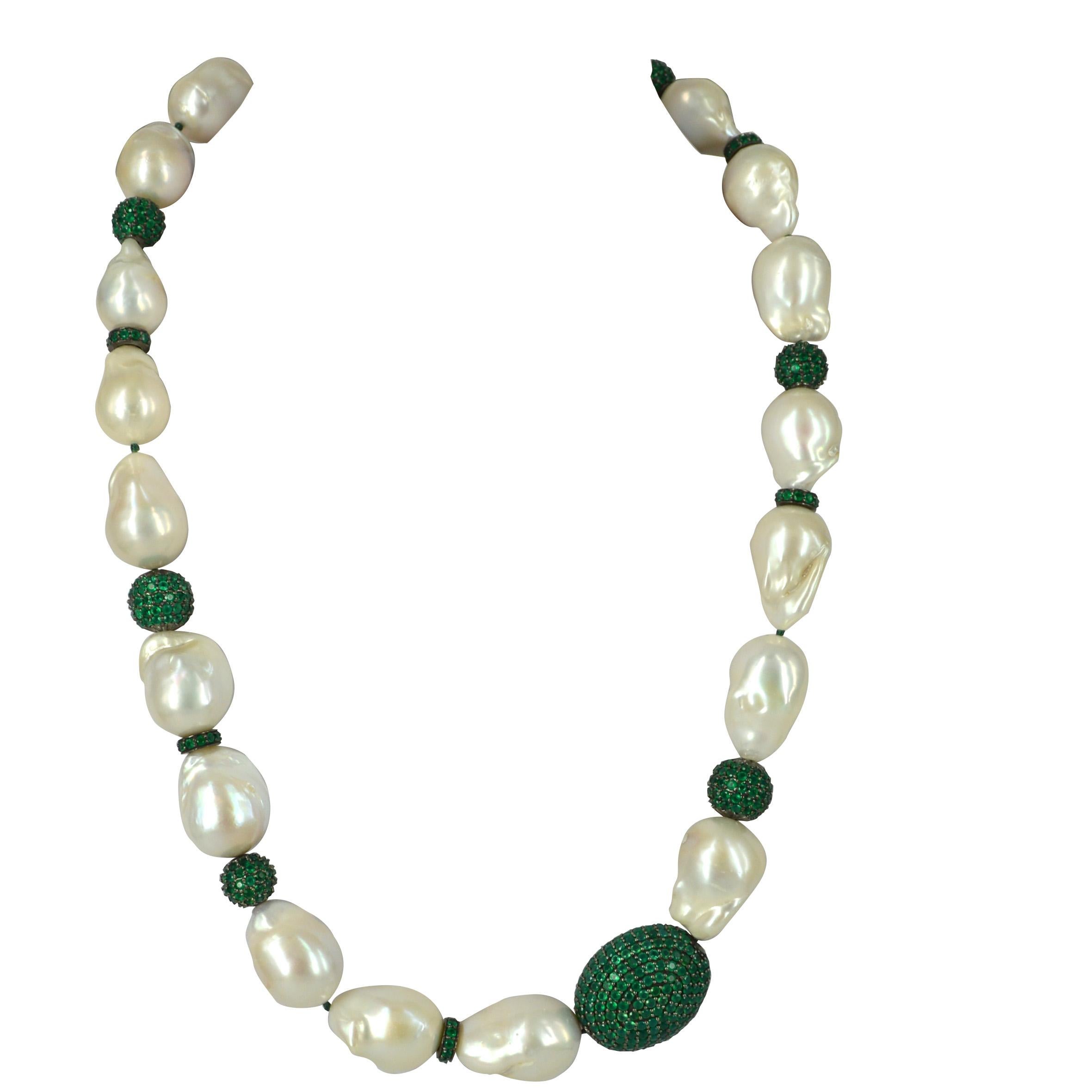 Stunning large Baroque Fresh Water Pearls with random Pave Green Onyx & Sterling Silver beads. Pearls range from 17mm up to 25.8mm long and the Pave Amethyst beads are 10mm & 12mm round 10x3mm rondel and 28x22mm oval shape.
Hand knotted on green