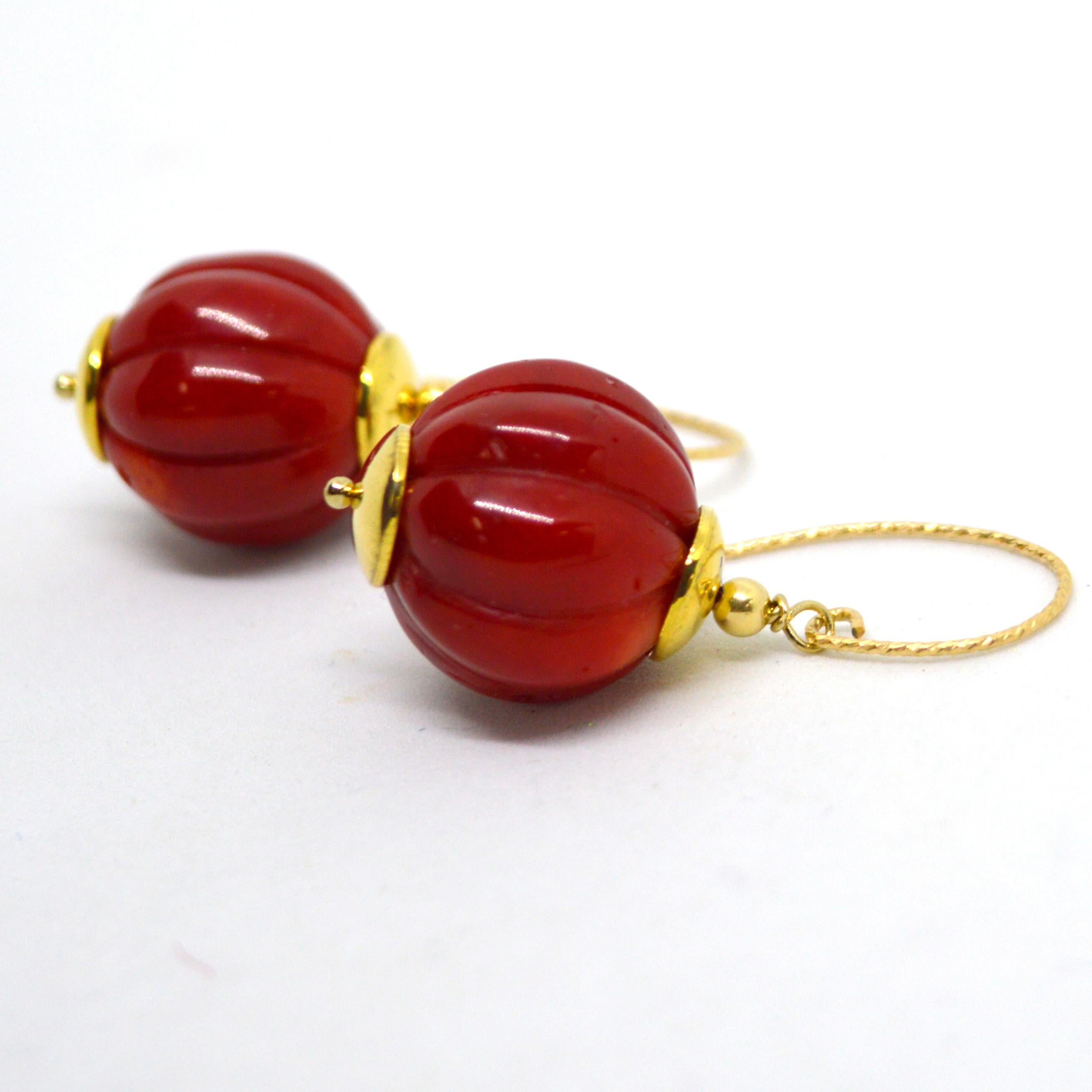 Carved Sea Bamboo bead dyed red, each bead is 18mm in size.
14k gold filled sheppard.
Total length of earring is 38mm with each earring weighing 6.5g.