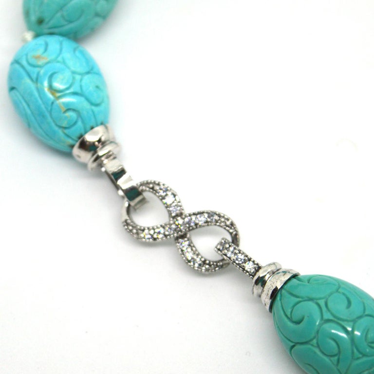 Modern Decadent Jewels Carved Turquoise Silver Necklace For Sale