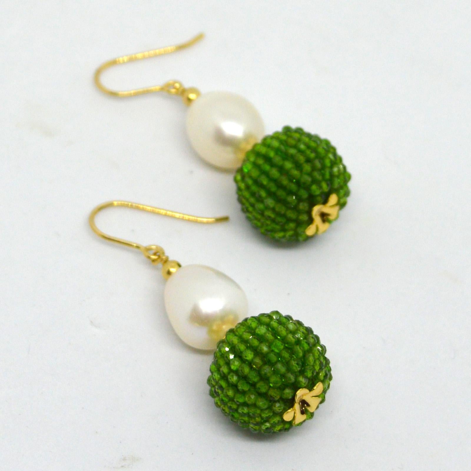 Natural Freshwater Pearl 15x10mm with a hand made beaded bead of natural Chrome Diopside mirco faceted beads 14k Gold Filled headpin and 3mm beads and Sheppard.

Total Earring length 45mm.

