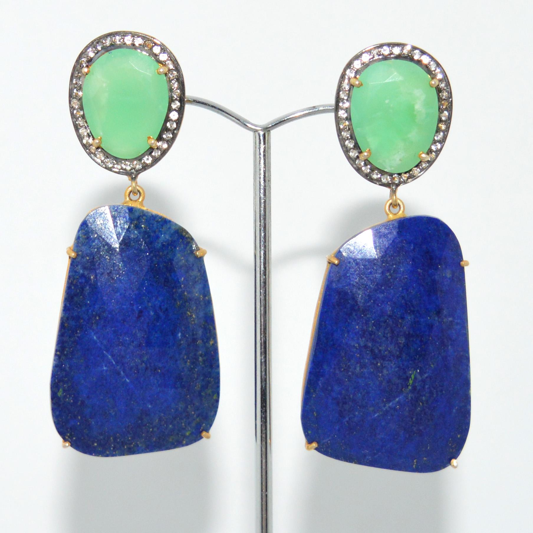 A Beautiful design Chrysoprase, and  Lapis Lazuli, complement each other surrounded with Rose cut Diamonds.
Description
Setting Sterling Silver Gold Plated
Diamond aprrox 1 Pointers 
Chrysoprase Faceted 16mm x 12.35mm
Lapis Lazuli Faceted 37.60mm x