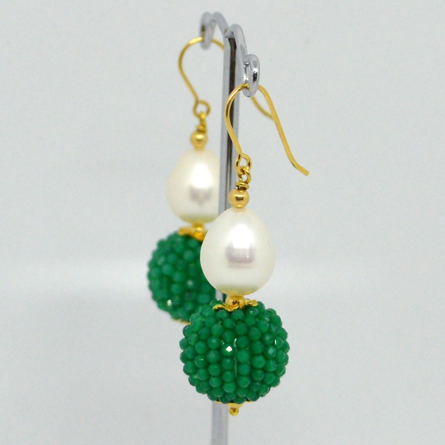 Natural Freshwater Pearl 15x10mm with a hand made beaded bead of natural Green Onyx mirco faceted beads 14k Gold Filled headpin and 3mm beads and Sheppard.

Total Earring length 45mm.
