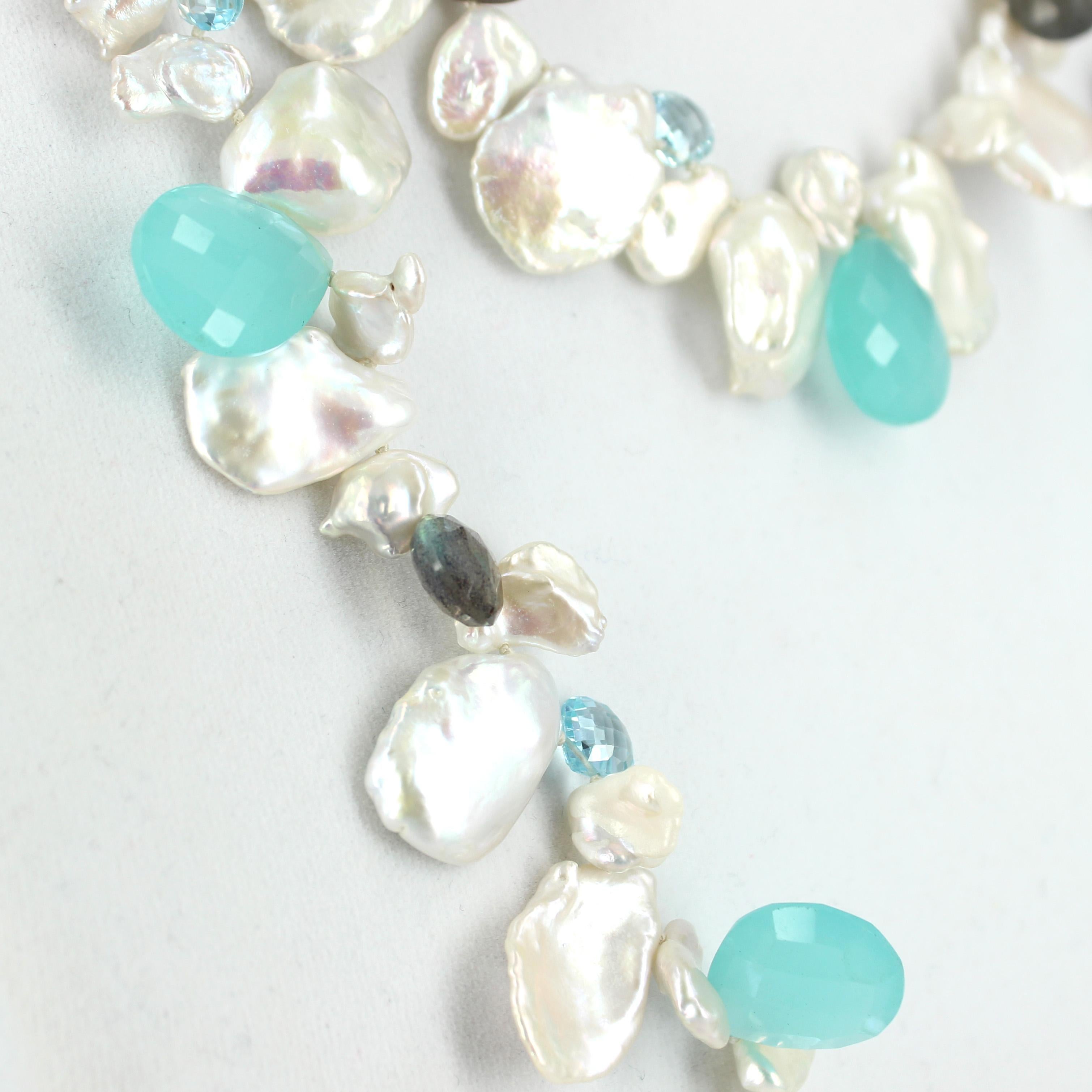 Coordinate this with any ensemble from business casual to everyday wear this l necklace has a beautiful lustre of Fresh Water Keshi Pearls, Faceted Chalcedony, faceted Blue Topaz. faceted Labradorite, they are all top side drilled, finished with