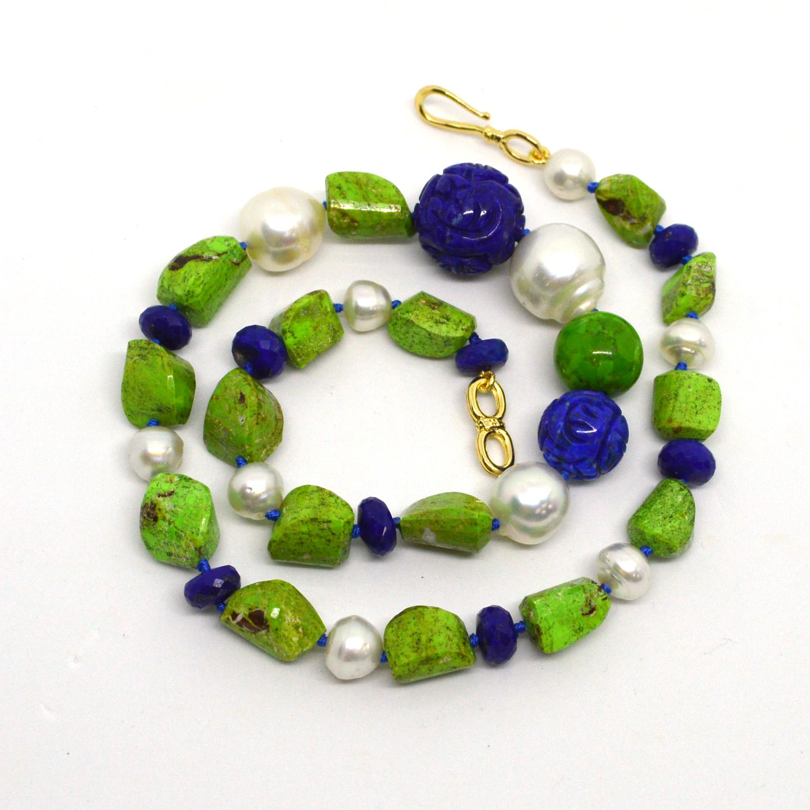 A Gorgeous pattern of Gaspeite, Australian South Sea Pearl and Lapis Lazuli beads with a feature of carved Lapis Lazuli beads. ( Largest lapis 18mm  largest south sea pearl 16mm ). Hand knotted on blue thread with a 14k gold filled hook clasp.
Total
