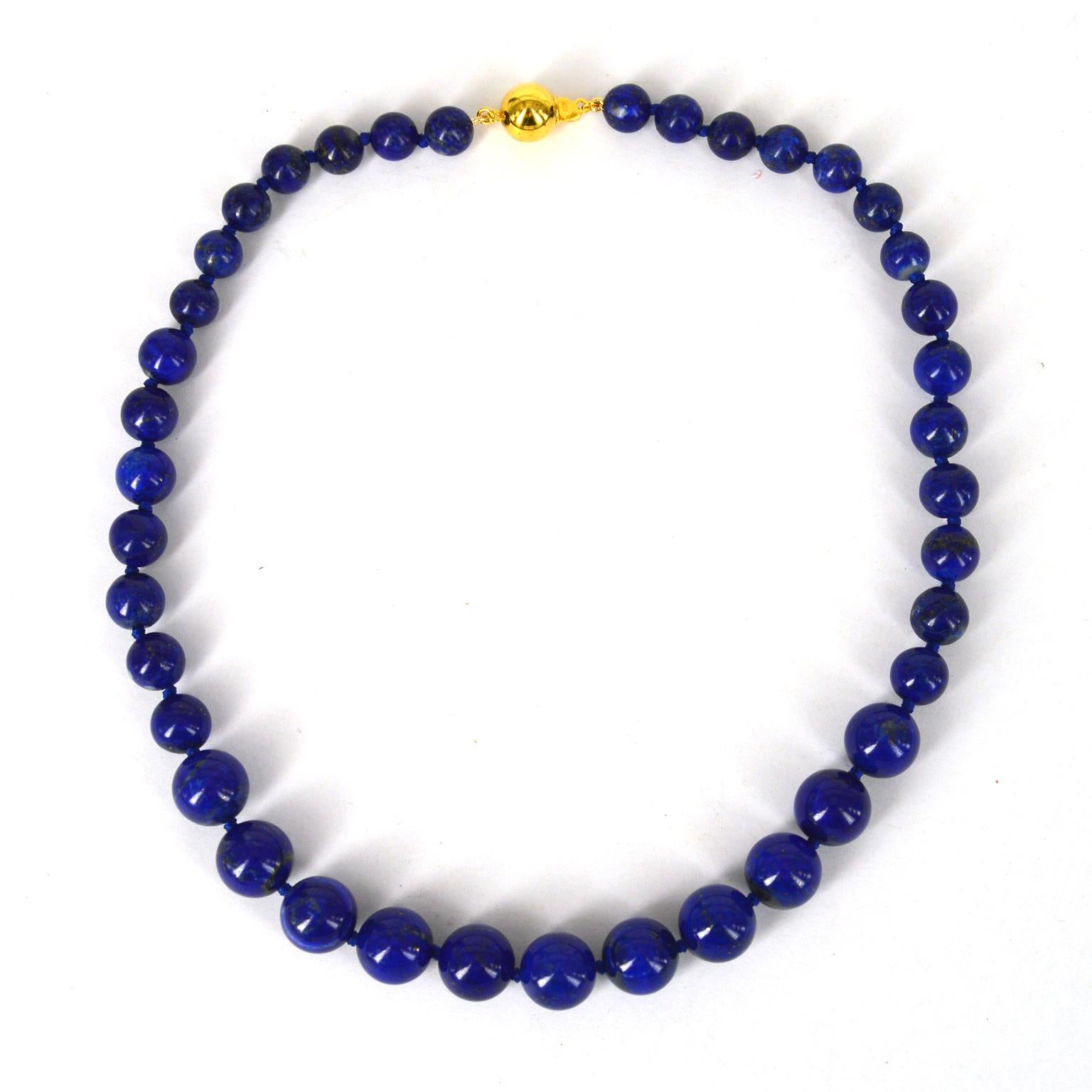 Graduated natural Lapis Lazuli beads 8mm-12mm hand knotted on blue thread with Gold plate Sterling Silver  10mm round clasp.
Total length of necklace 45cm.

