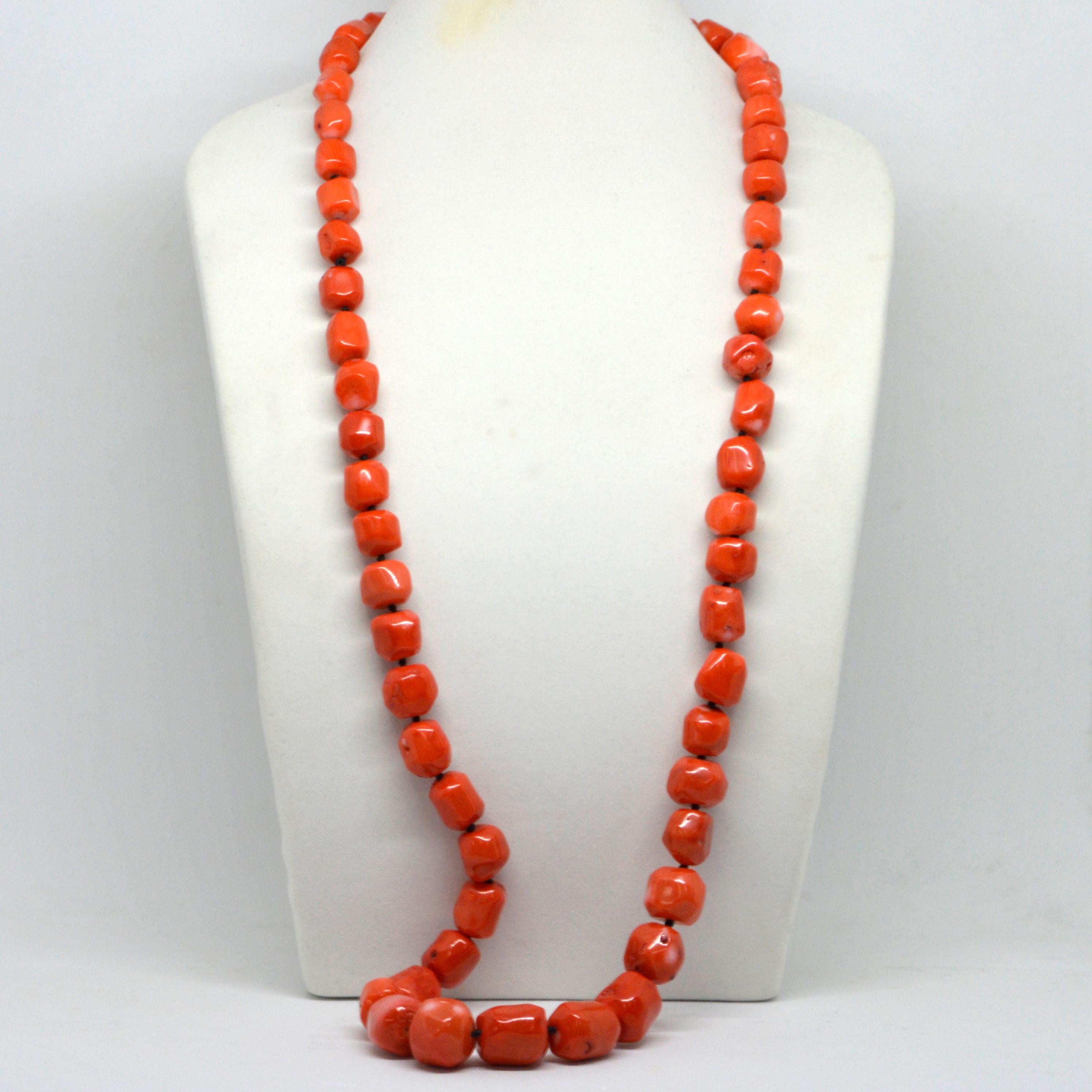 Graduated Orange Sea Bamboo Coral nuggets hand knotted on Black Thread.

Coral Graduated from 12-21mm
Total Necklace Length 94cm / 37 inches
Weight 286.63gr