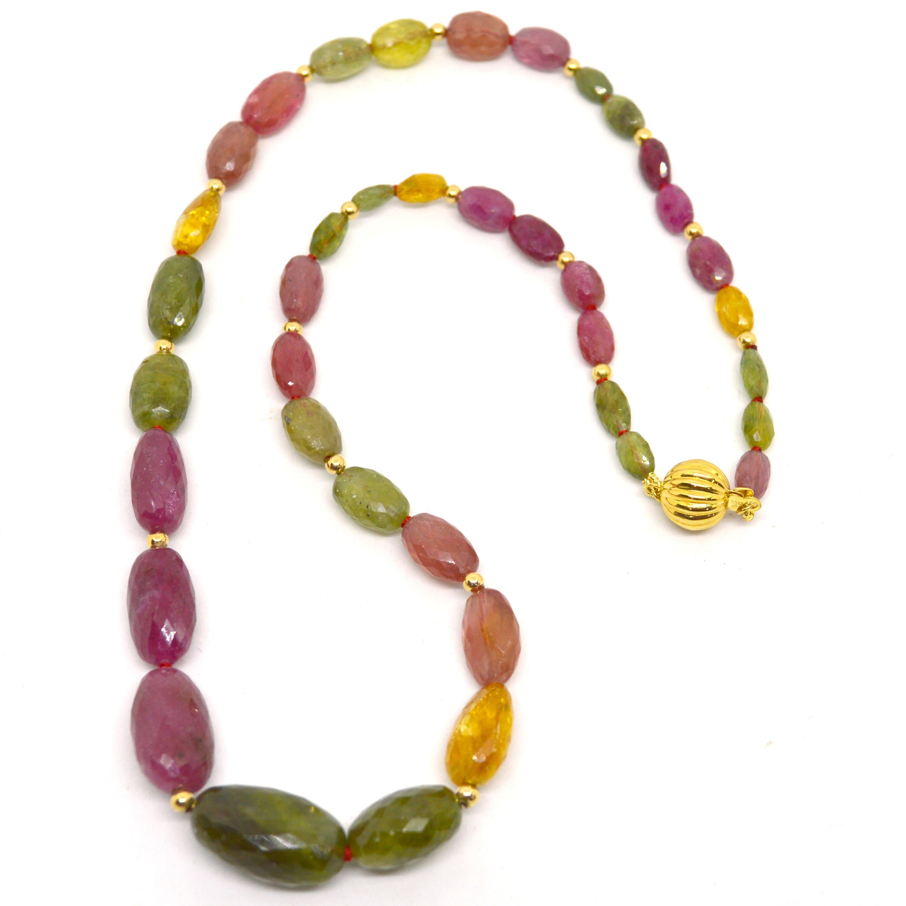 Vibrant multicoloured Sapphire faceted beaded necklace with 14k Gold spacer beads and a 9k gold clasp.

Total length of necklace 52cm /20.4 inches.

