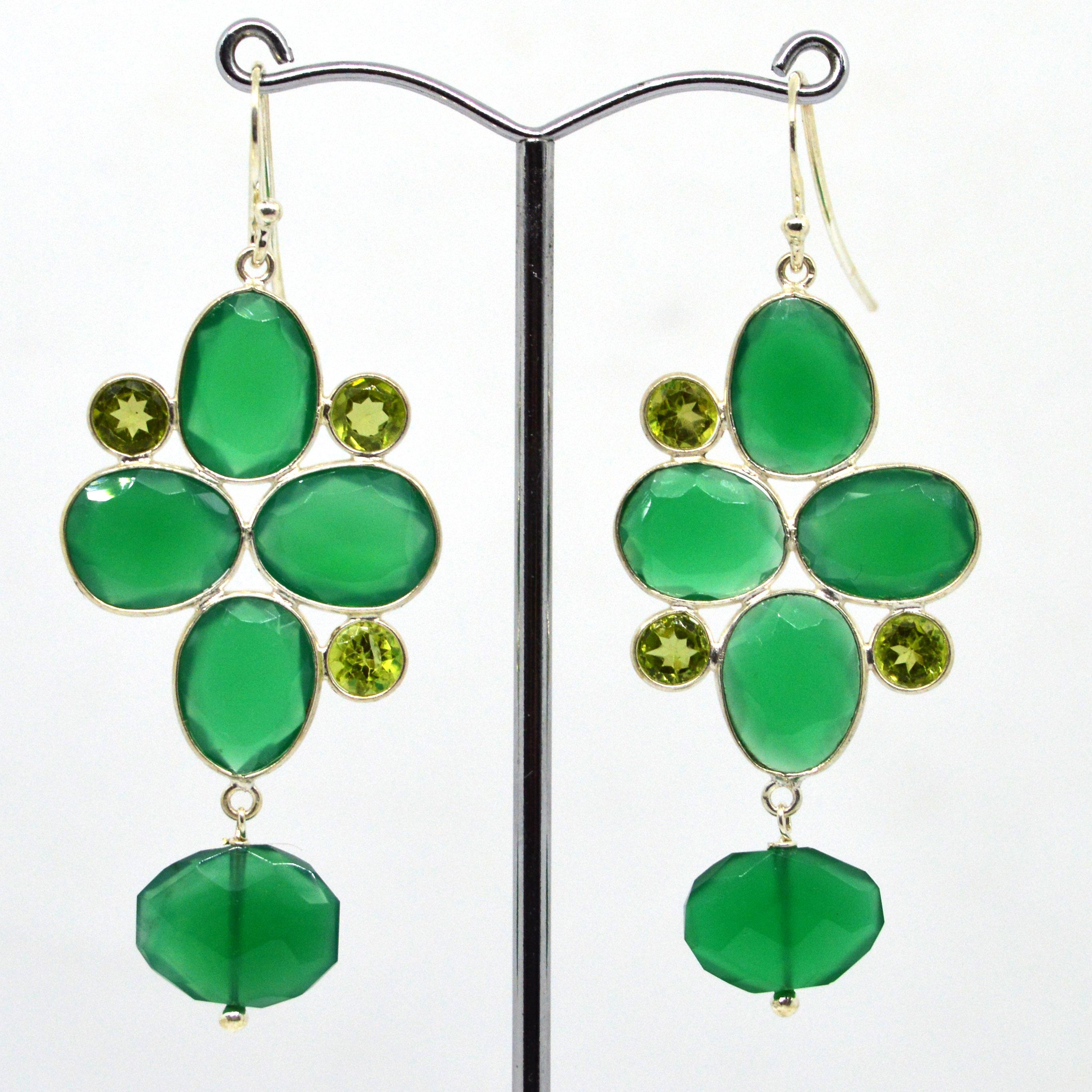 Green with Envy Luscious Peridot and Green Onyx set in Sterling Silver, Peridot 5mm Round Brilliant cut with Oval Green Onyx 10x12mm and a 13.5x9.6mm Faceted flat Oval drop. 
Metal Sterling Silver

Total Earring Length 6cm / 2.36in
Total Weight 