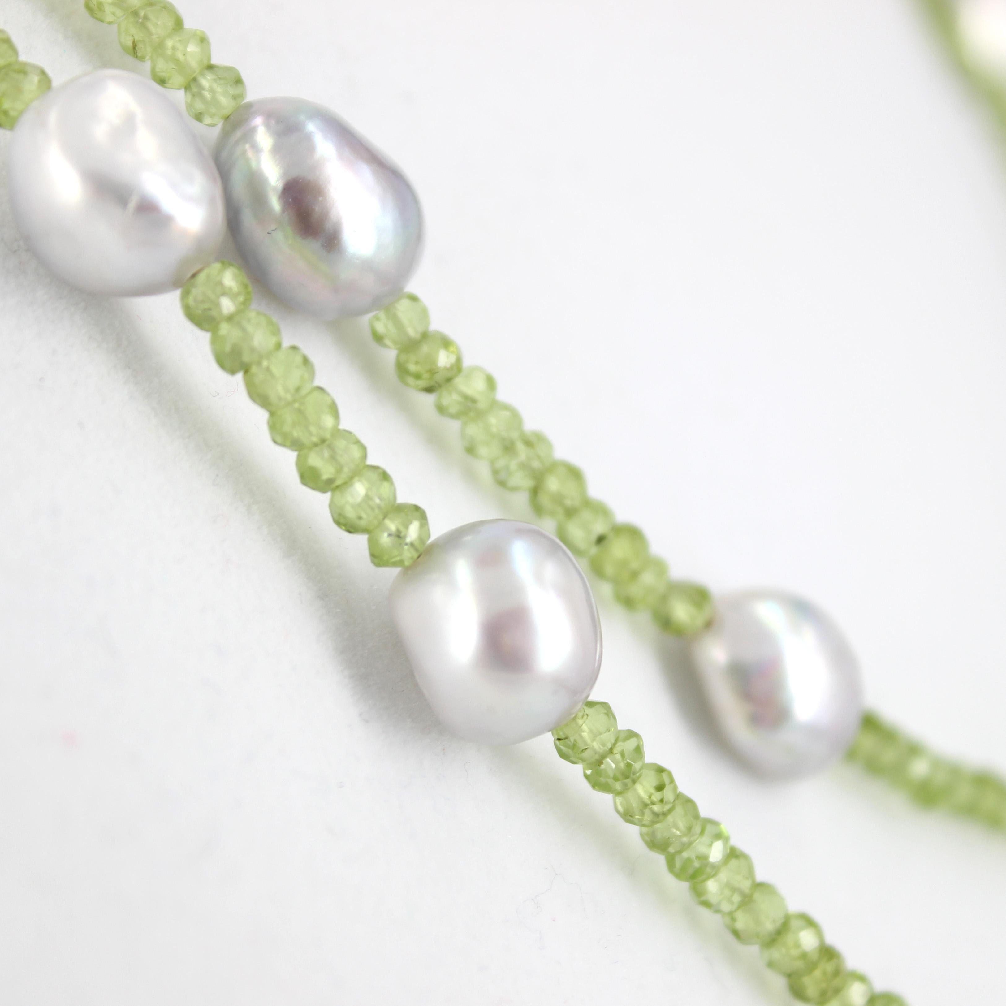 Out in a hurry just throw this simple necklace on and look elegant, you can wear it as a single strand or wrap it around your neck for a double layer effect, this Faceted Peridot, is complemented with Lite Grey Fresh Water Pearls, finished with