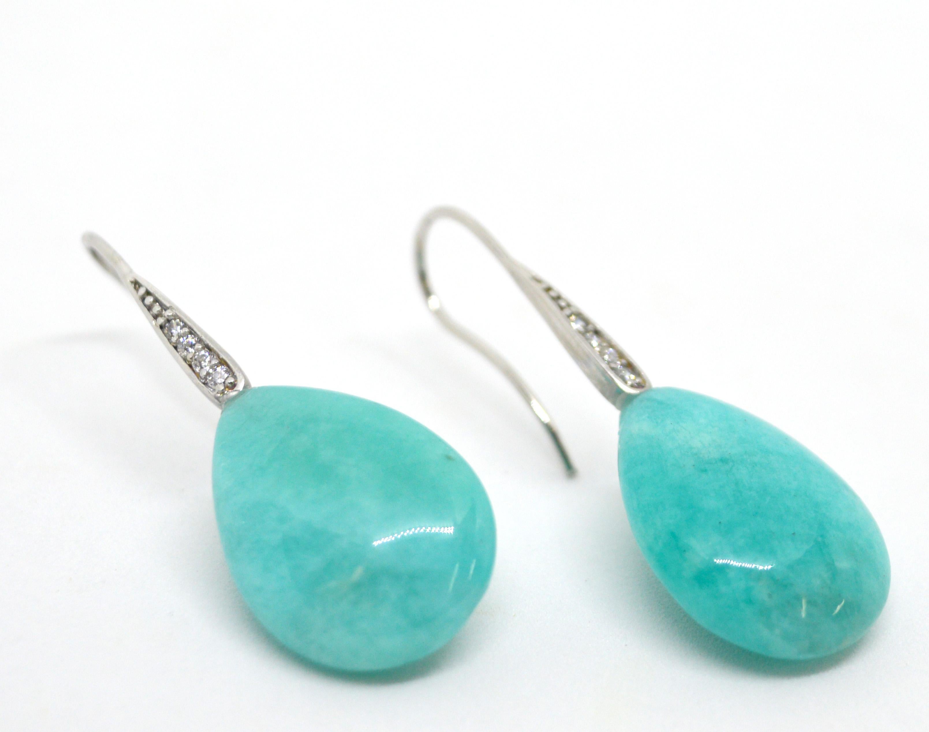 Beautiful Peruvian Amazonite 15x20mm with a Sterling Silver CZ Sheppard.

Total Earring length 42mm.