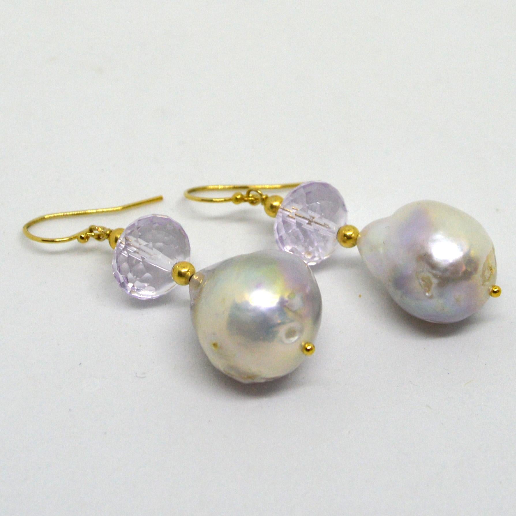 Stunning Faceted Pink Amethyst with a high Quality Pink Baroque Fresh Water Pearl.
Amethyst Beads measure 11x8mm with a 17x15mm Pearl.
All findings are 14k Gold Filled
length of Earrings is 42mm

