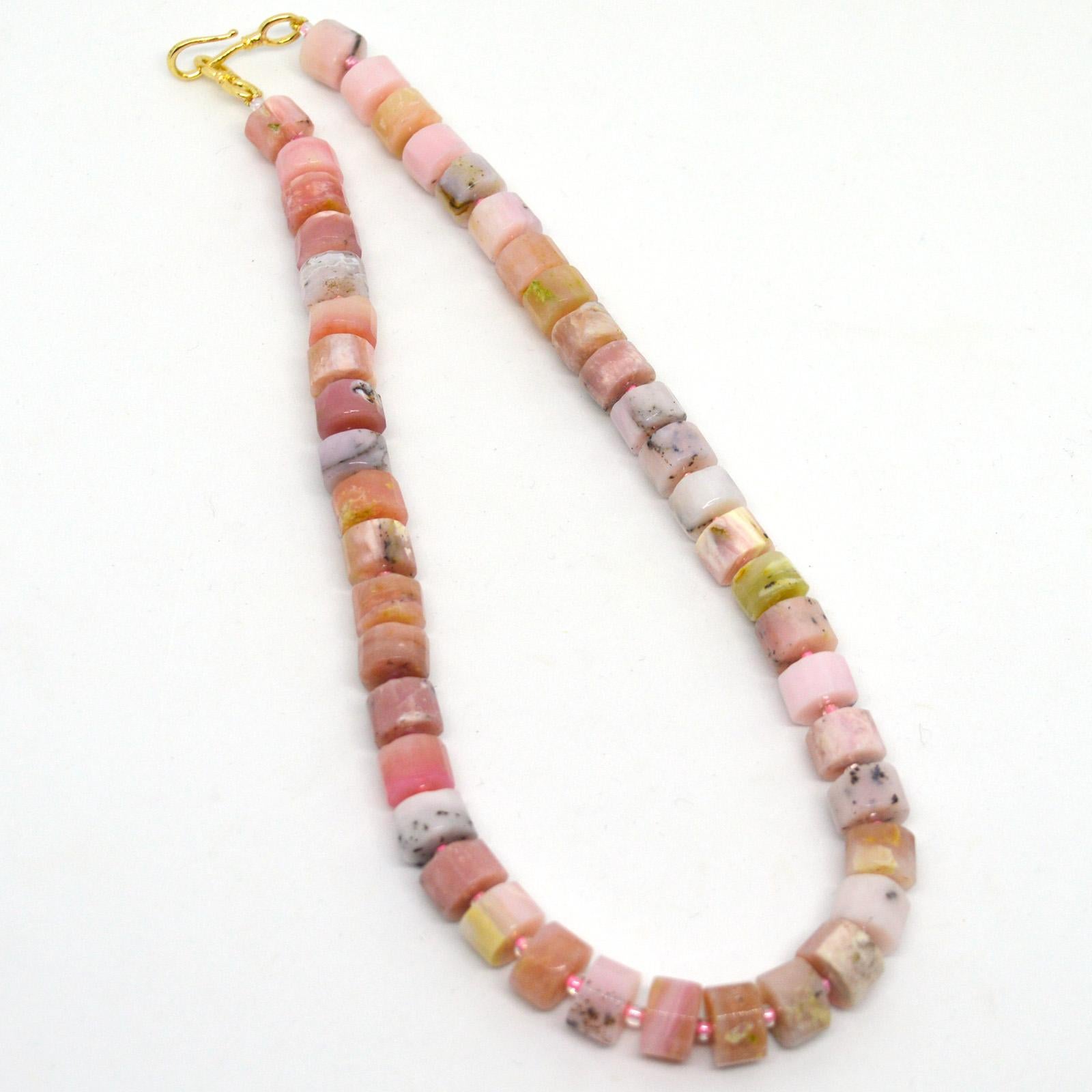 Delicate faceted wheels of Pink Opal stone approx 10x6mm short necklace finished with a easy Gold filled hook clasp.
Finished length is 44.5cm  17.5 inches