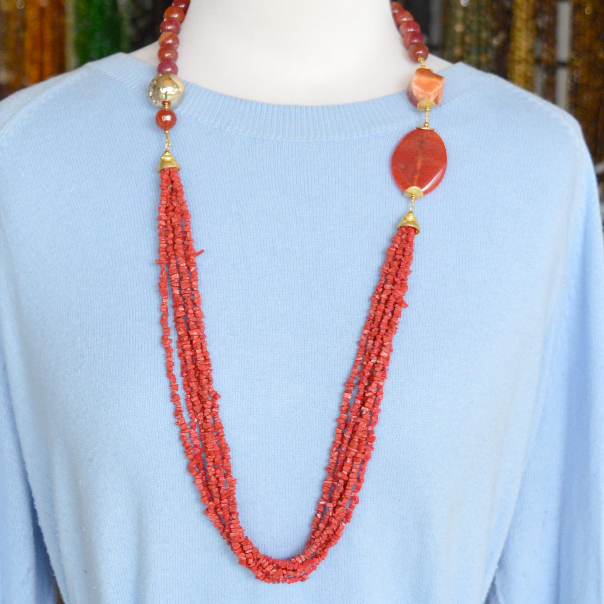 Turn a basic outfit into something more and create a lasting style statement you’ll reach for all season long. 
Bright and Vibrant Red Reconstituted Sea Bamboo Chips with Agate beads necklace.  Gold plate Copper cap, feature bead and spacer
