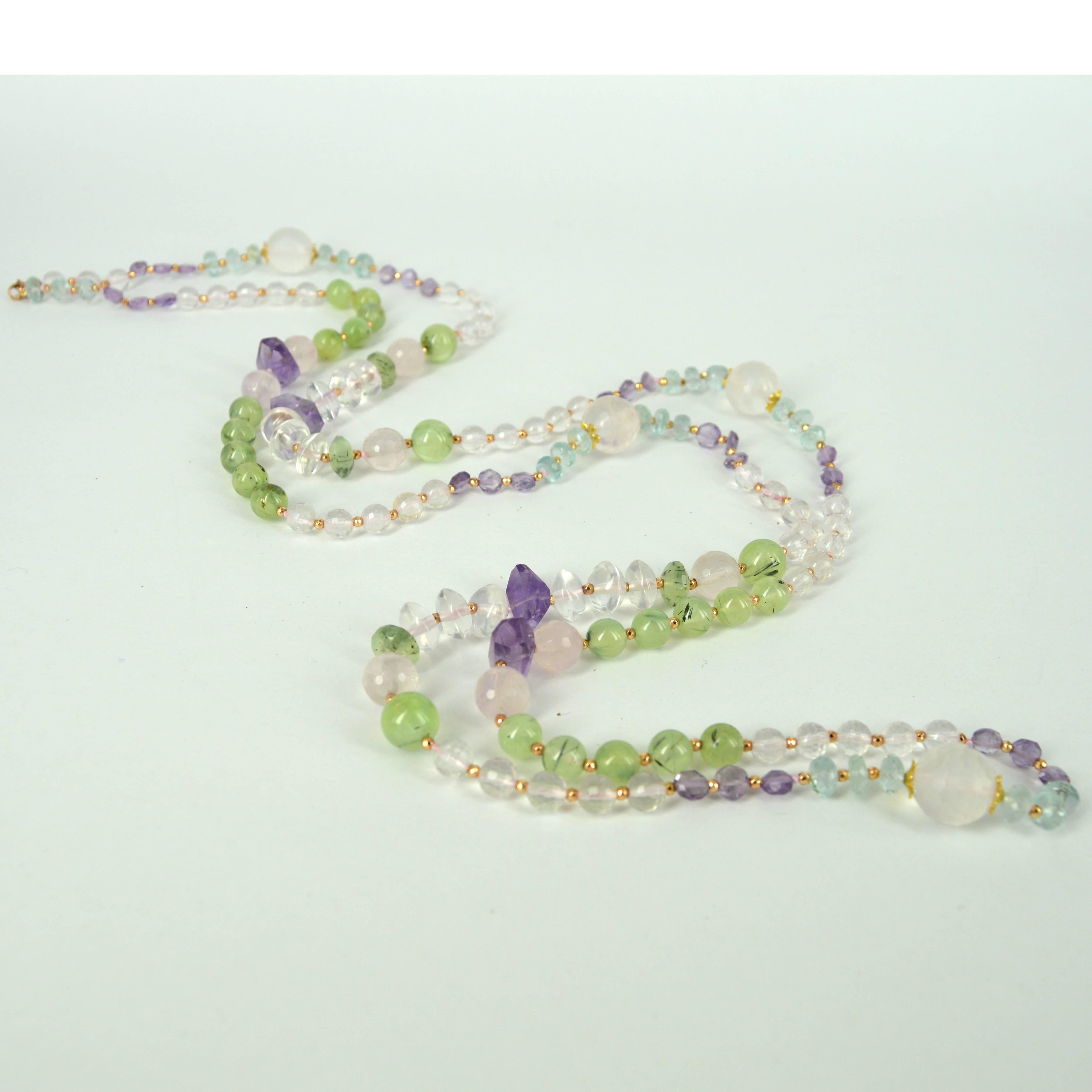 Versatile long necklace that can be worn as a long Single, double or 3 short strands. Necklace is made from 6.5mm, 10mm and 14mm Faceted Rose Quartz beads, 8mm, 10mm and 9x5mm Prehnite Beads, 6mm flat Round and 13x6mm Faceted side drill nugget