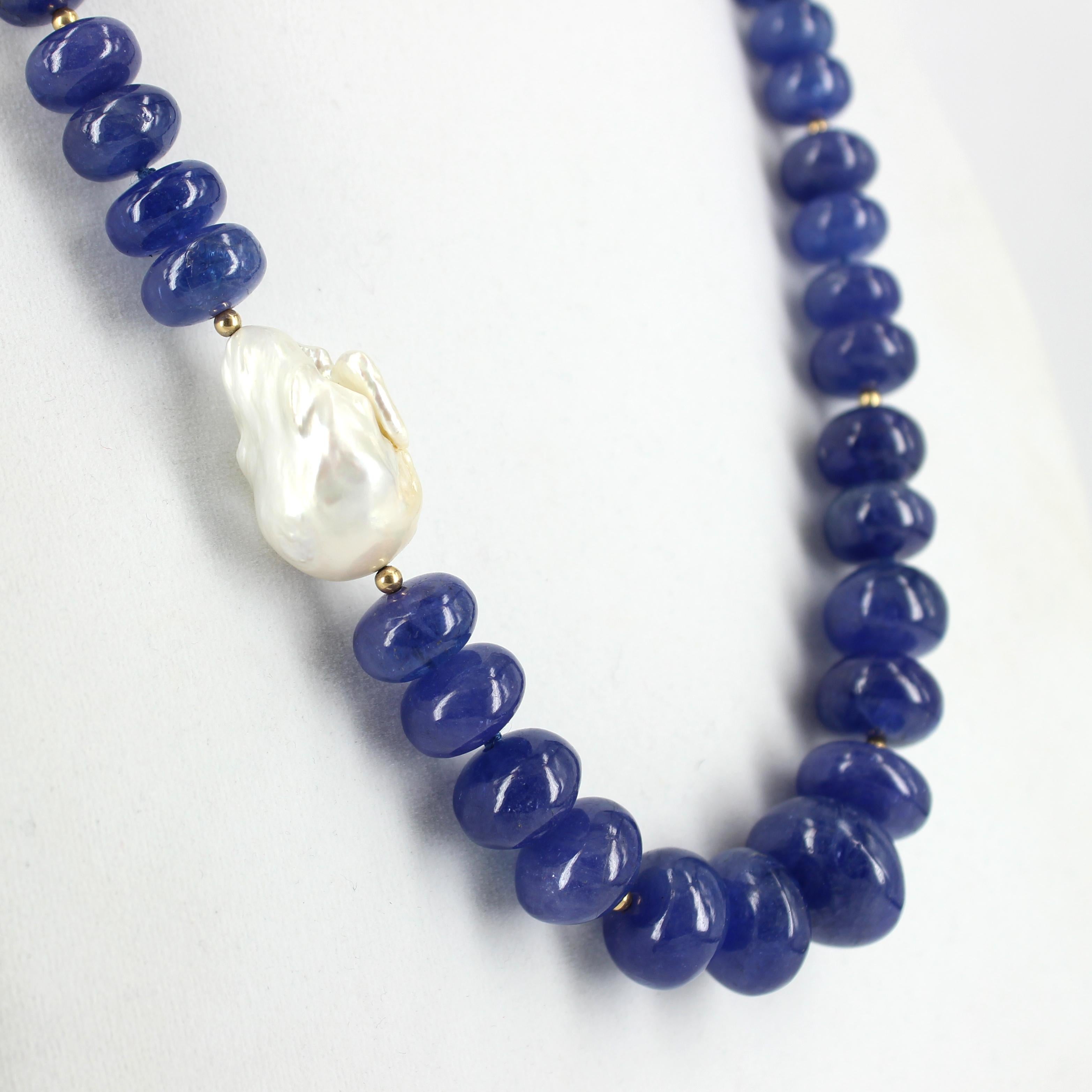 Tanzanite one of the most desired gems in the world. Tanzanite has a beautiful striking shade of blue, complemented with Fresh Water Baroque Pearl off-centred, it would make a standout addition to your collection.

Description Tanzanite Graduated