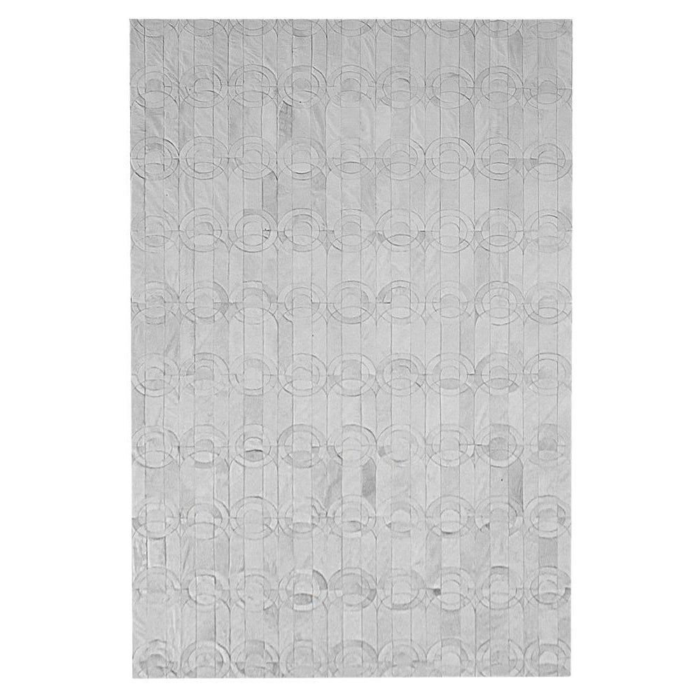 Magnifique tapis de sol personnalisable Curvo crème en cuir de vache XLarge