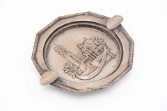 Decagonal silver ashtray with reliefs