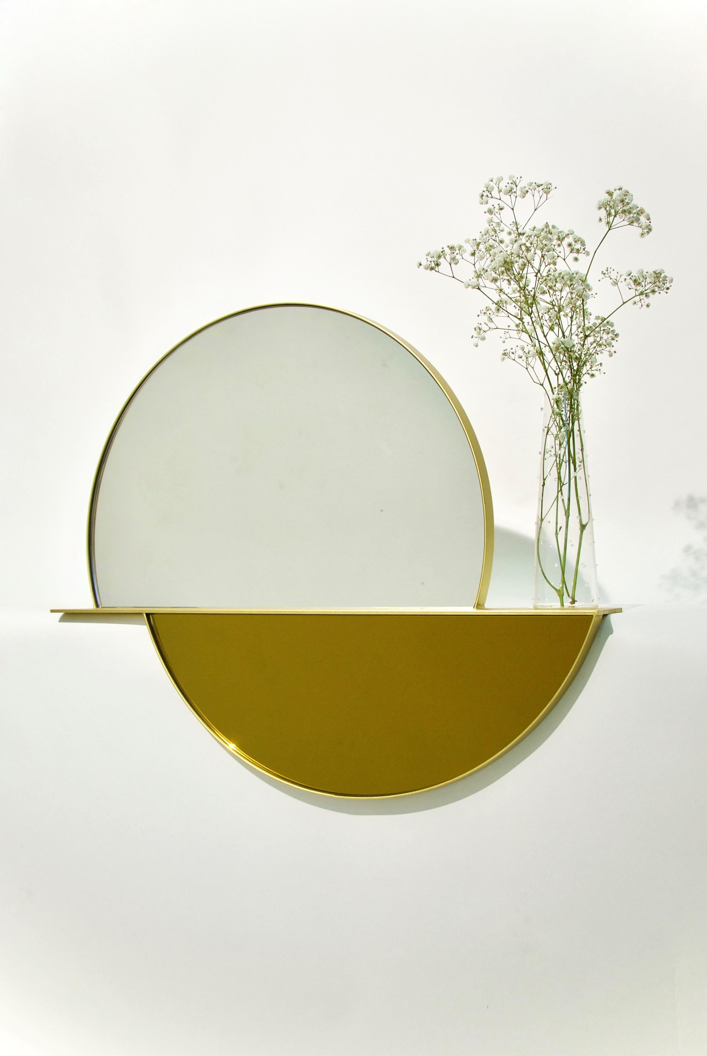 Décalé mirror by Helder Barbosa
Materials: brass
Dimensions: 90 x 80 x 15 cm

Trained as a craftsman (école Boulle, 2014), Helder Barbosa is a designer who lives and works in Paris.
Attracted by minimalist shapes, he creates furniture with soft