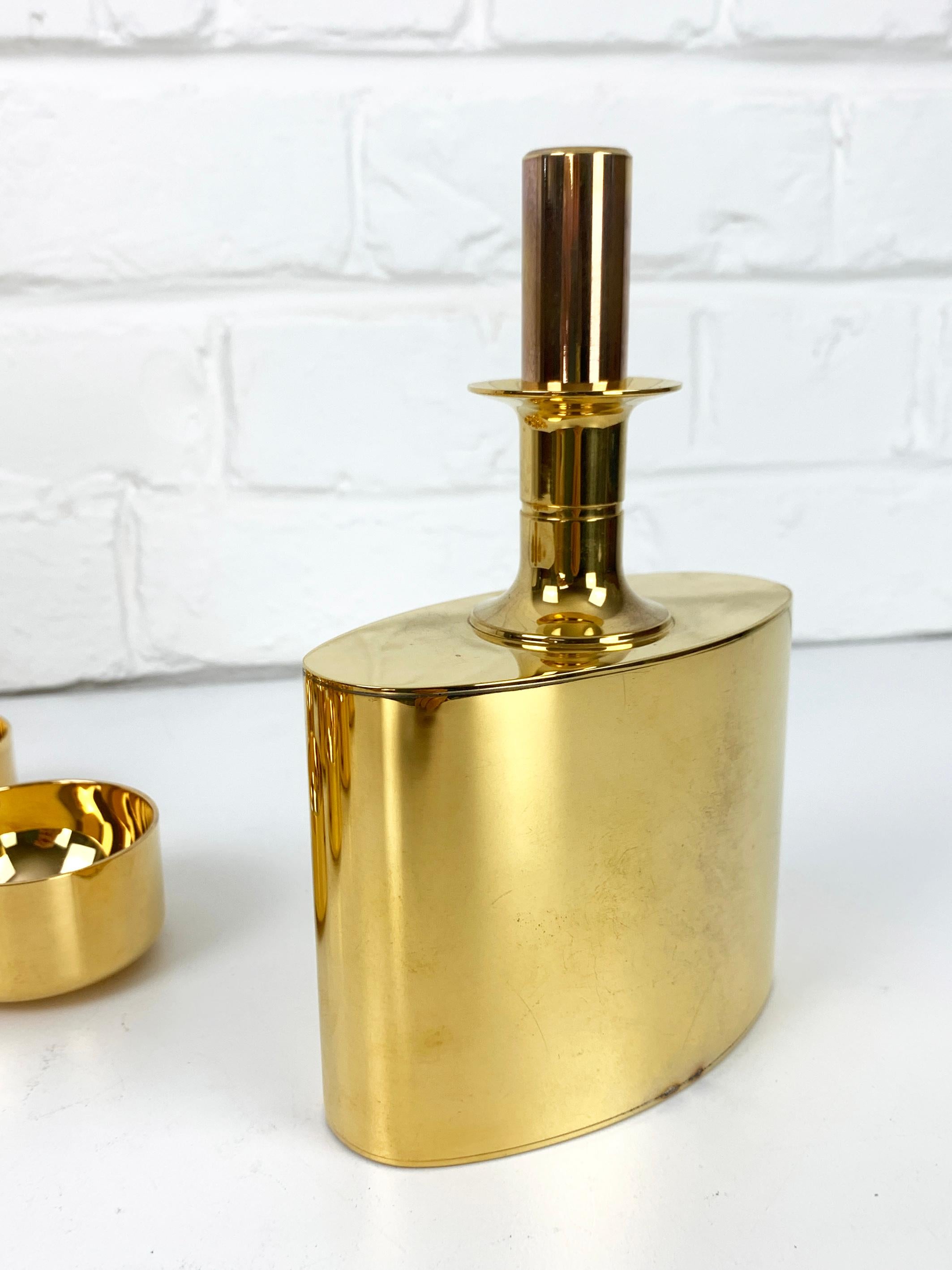 Swedish Decanter & 12 bowls in gold plated brass, Pierre Forsell for Skultuna, 1960s For Sale