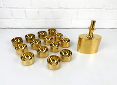 Decanter e 14 ciotole in ottone placcato oro, Pierre Forsell per Skultuna, anni '60