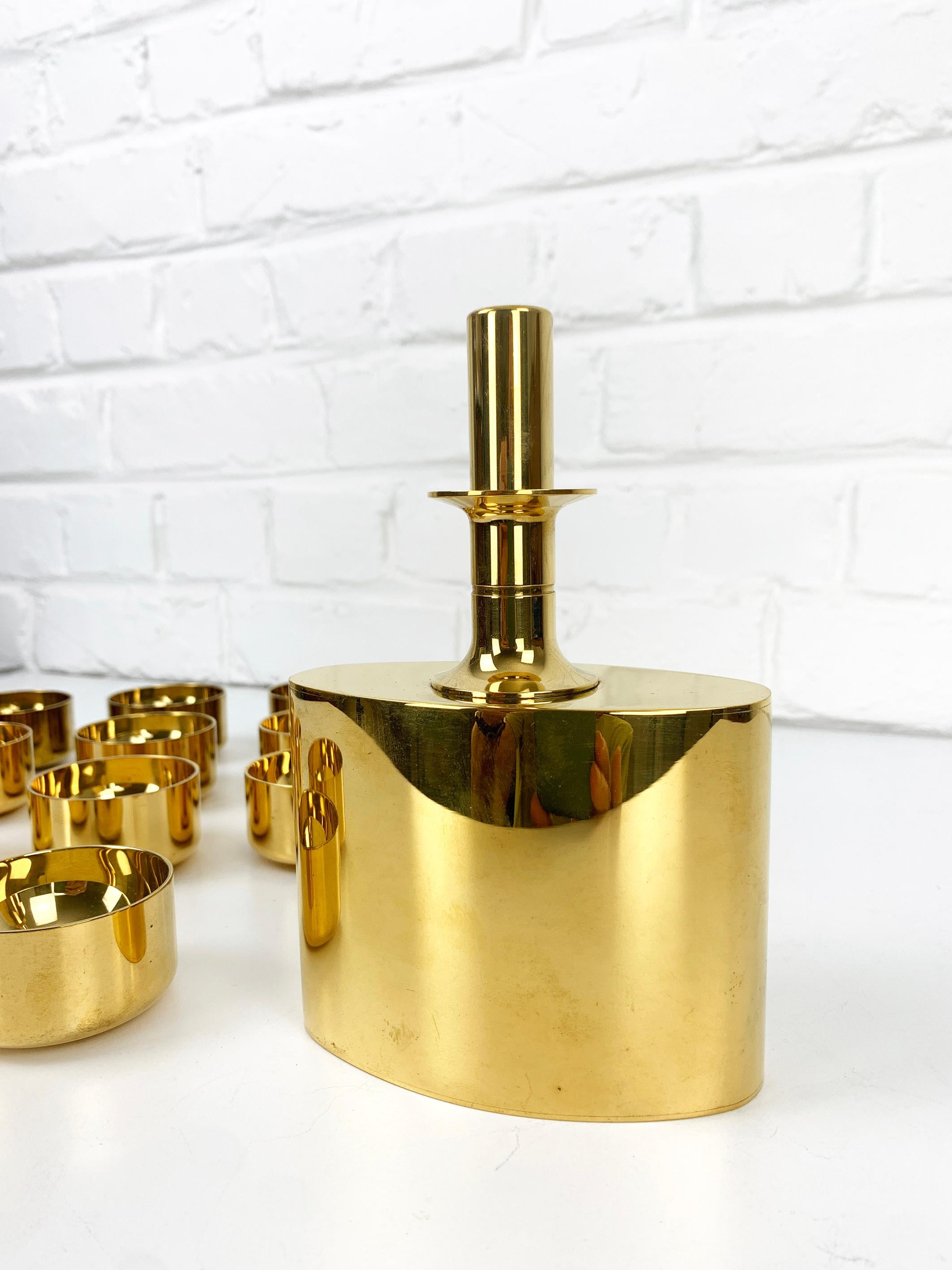 Swedish Decanter & 14 bowls in gold plated brass, Pierre Forsell for Skultuna, 1960s