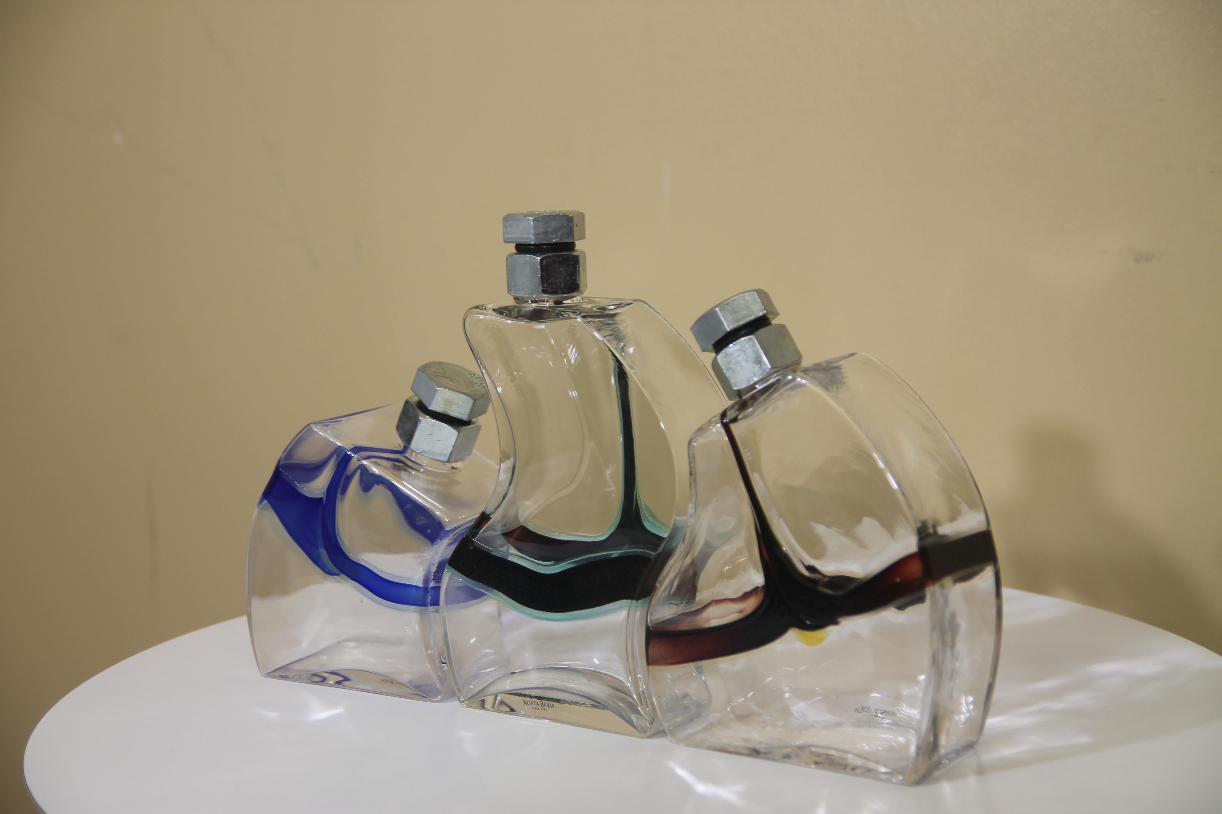 Great set of 3 decanters by Kosta Boda. This decanter was call 