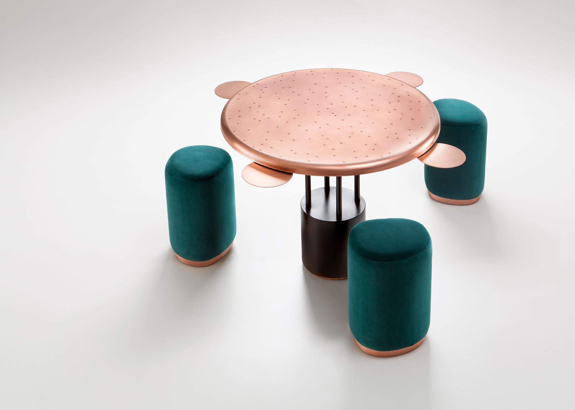 Burraco Game Table designed by Zanellato/Bortotto for DeCastelli. The DeErosion technique is used for producing the natural fire-treated copper at the top. Four circular copper plates are attached in the different corners for placing playing cards