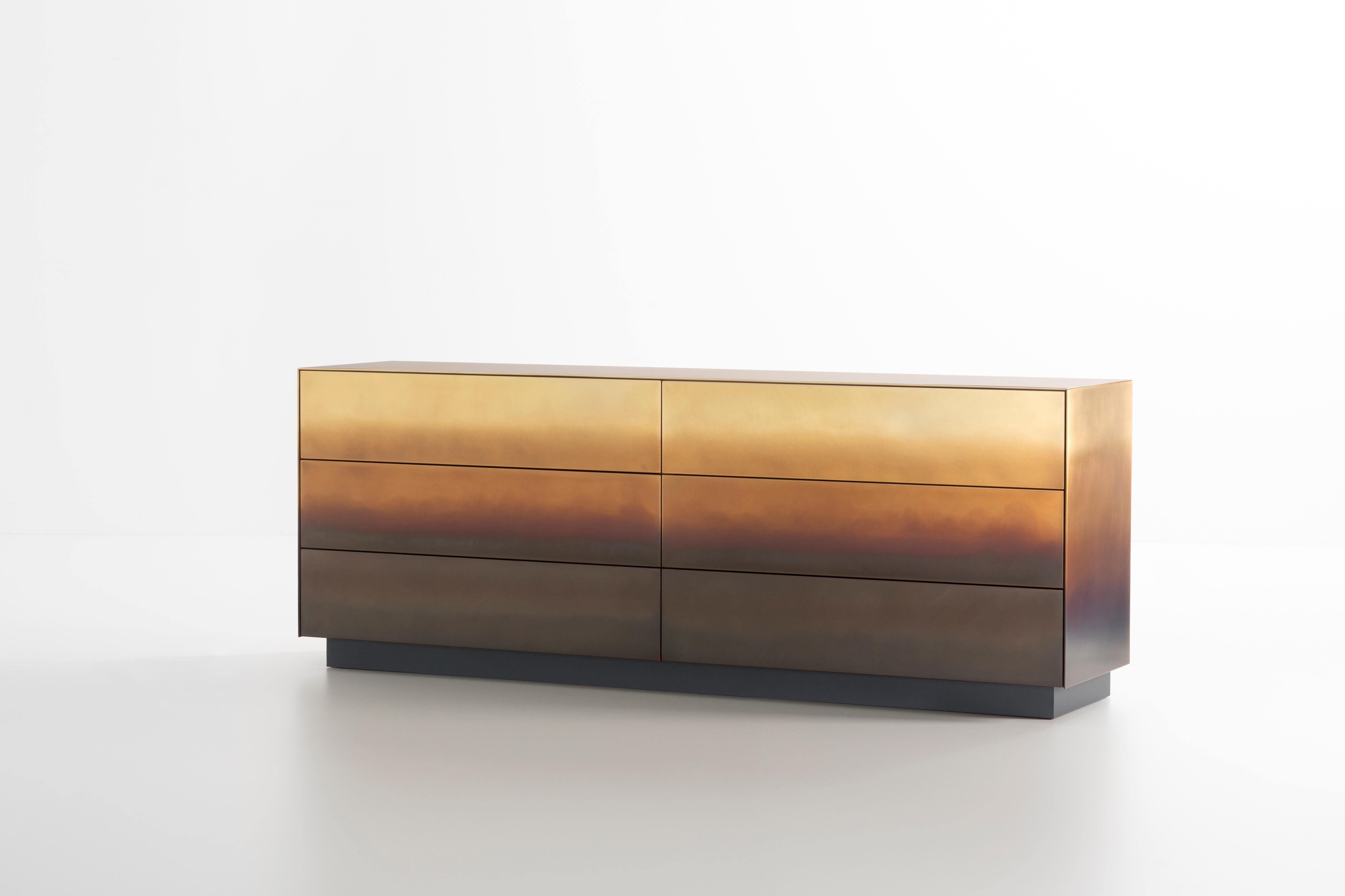 The traces of time are drawn one on top of another, infused into the changing skin of the rigorous metal forms that define these cabinets and chests. Like the tide (marea in Italian) leaves its mark, wave after wave, even here the hand of the