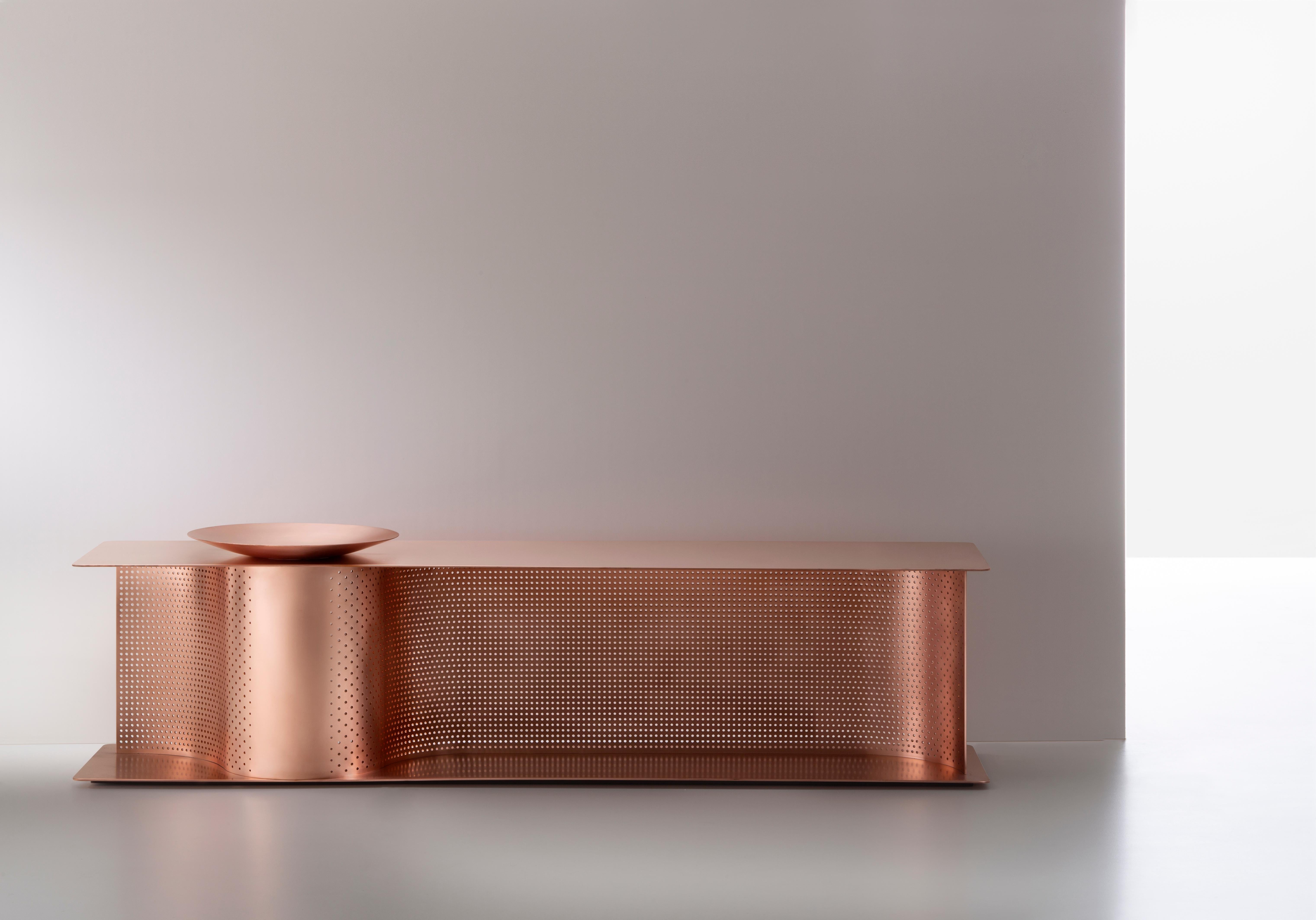 With its essential shapes and gentle, sinuous sense of movement, Wave suggests a renewed, more conscious focus on the ritual of arriving home. The project reinterprets a quintessential piece Asian furniture: the shoe bench. Its humble function as a