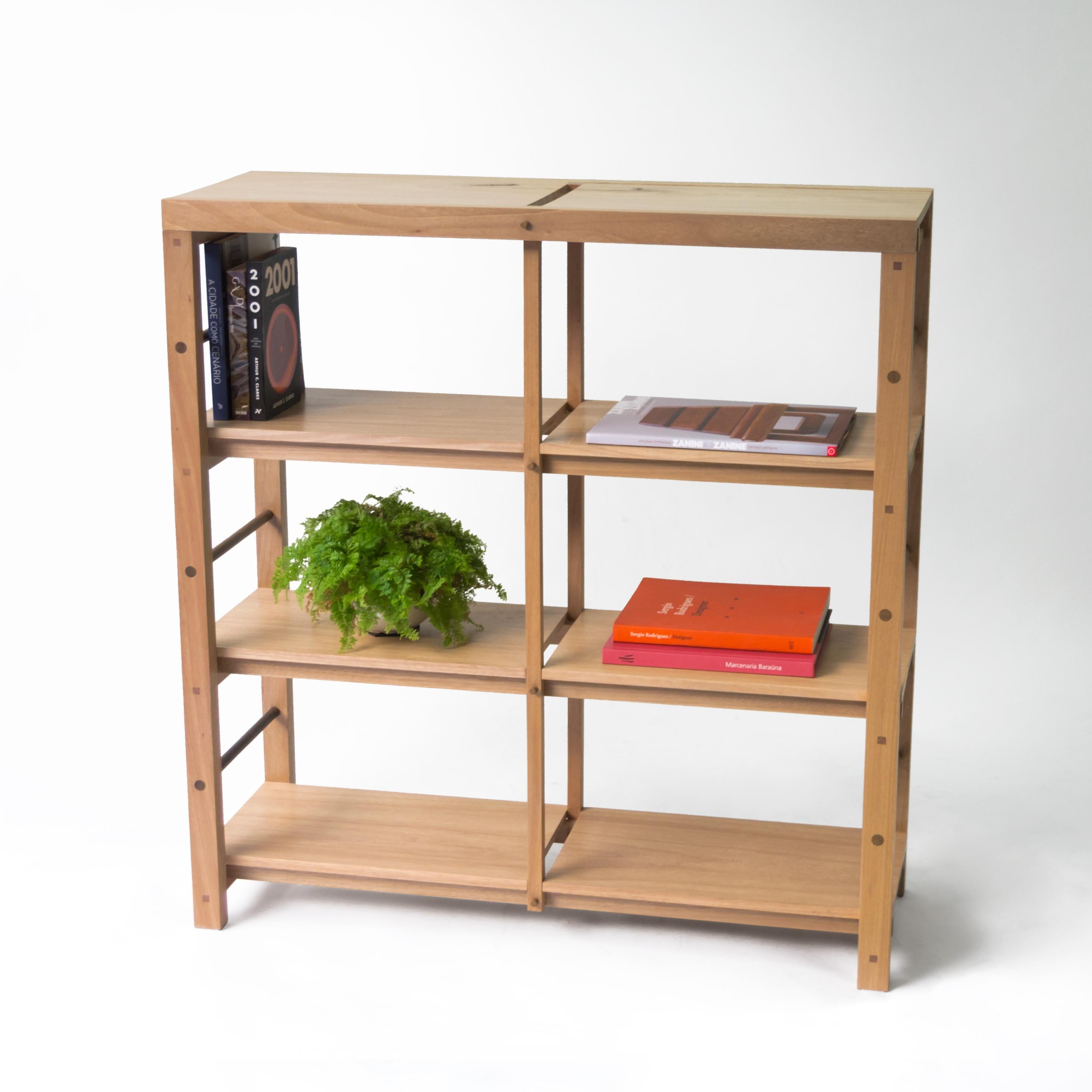Ideal furniture for storing books and decorative pieces.
It also works as a sideboard and can be used in kitchens or dining rooms to store crockery and cutlery.

Built using traditional joinery techniques, no screws. Jequitibá-Rosa wood, details