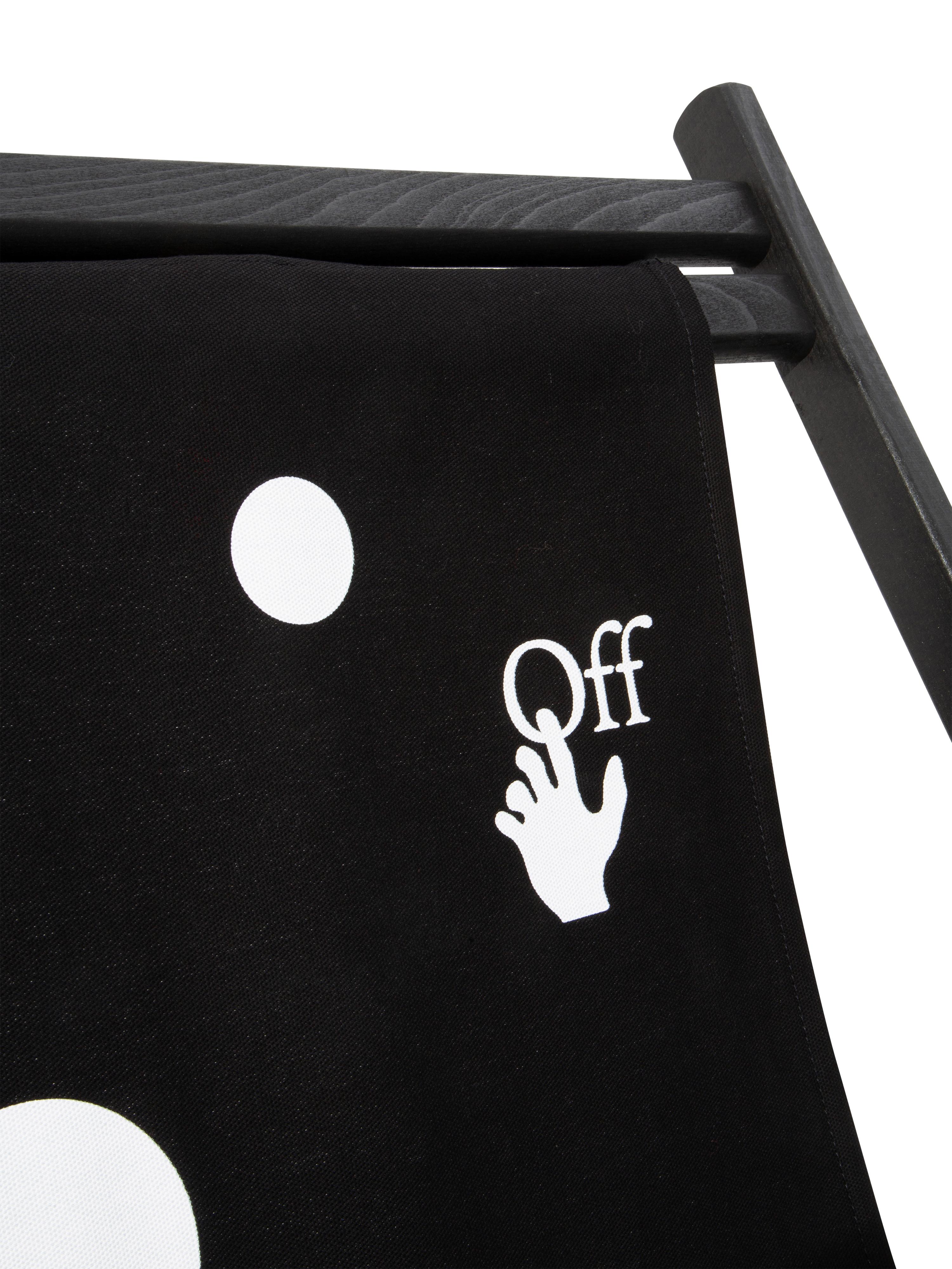 Wooden deck chair with printed canvas with holed pattern and Off hand logo. Black wood with white printed black canvas. HOME orange label on the back
By Virgil Abloh
Dimensions: 59 W x 96 D x 106 H
This item is only available to be purchased and
