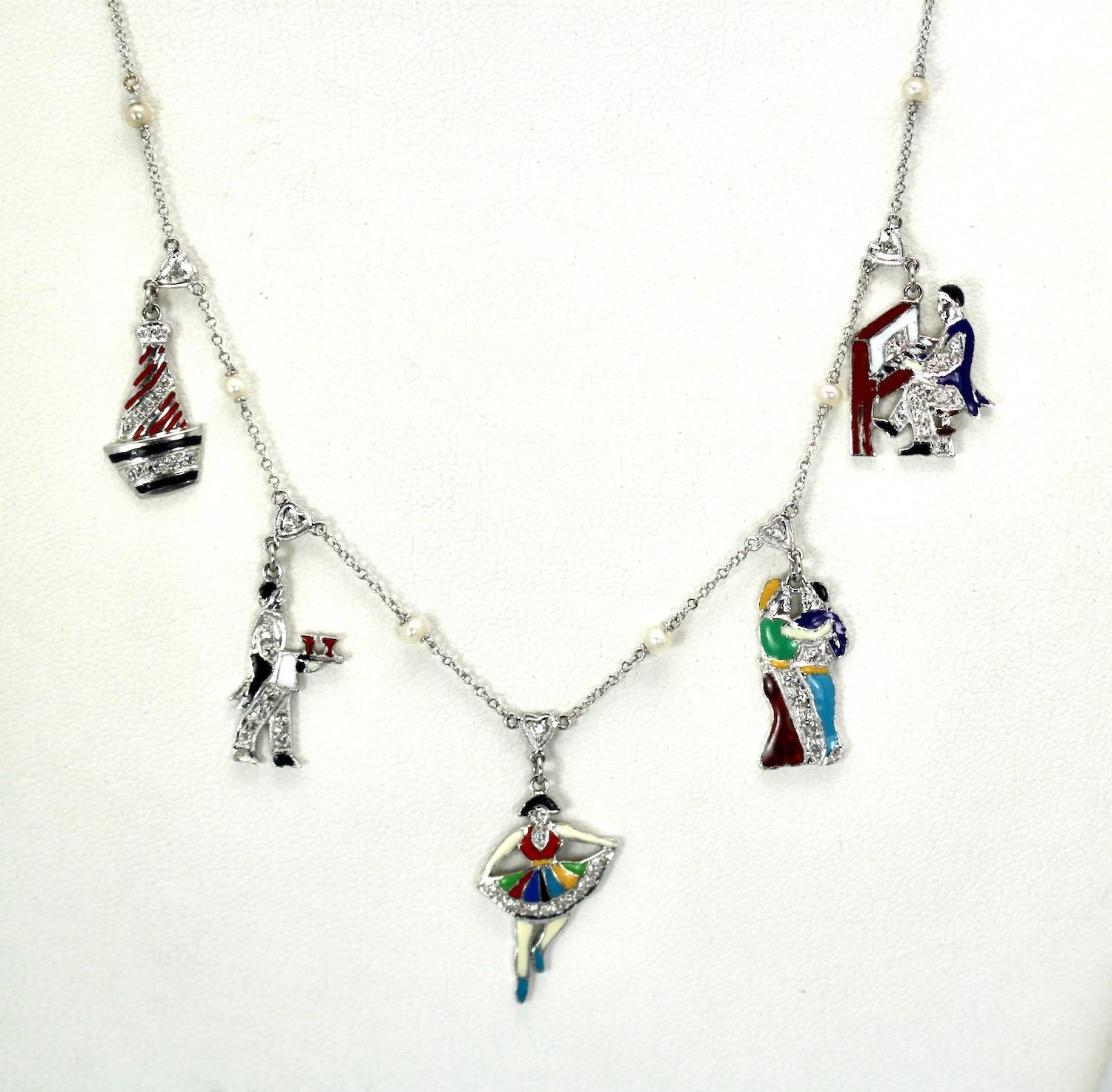 This gorgeous Charm necklace started out life as a Charm bracelet I had this turned into a necklace keeping all the original elements of this bracelet.  The charms are held by Diamond hearts and between each charm are tiny seed pearls.  The colors