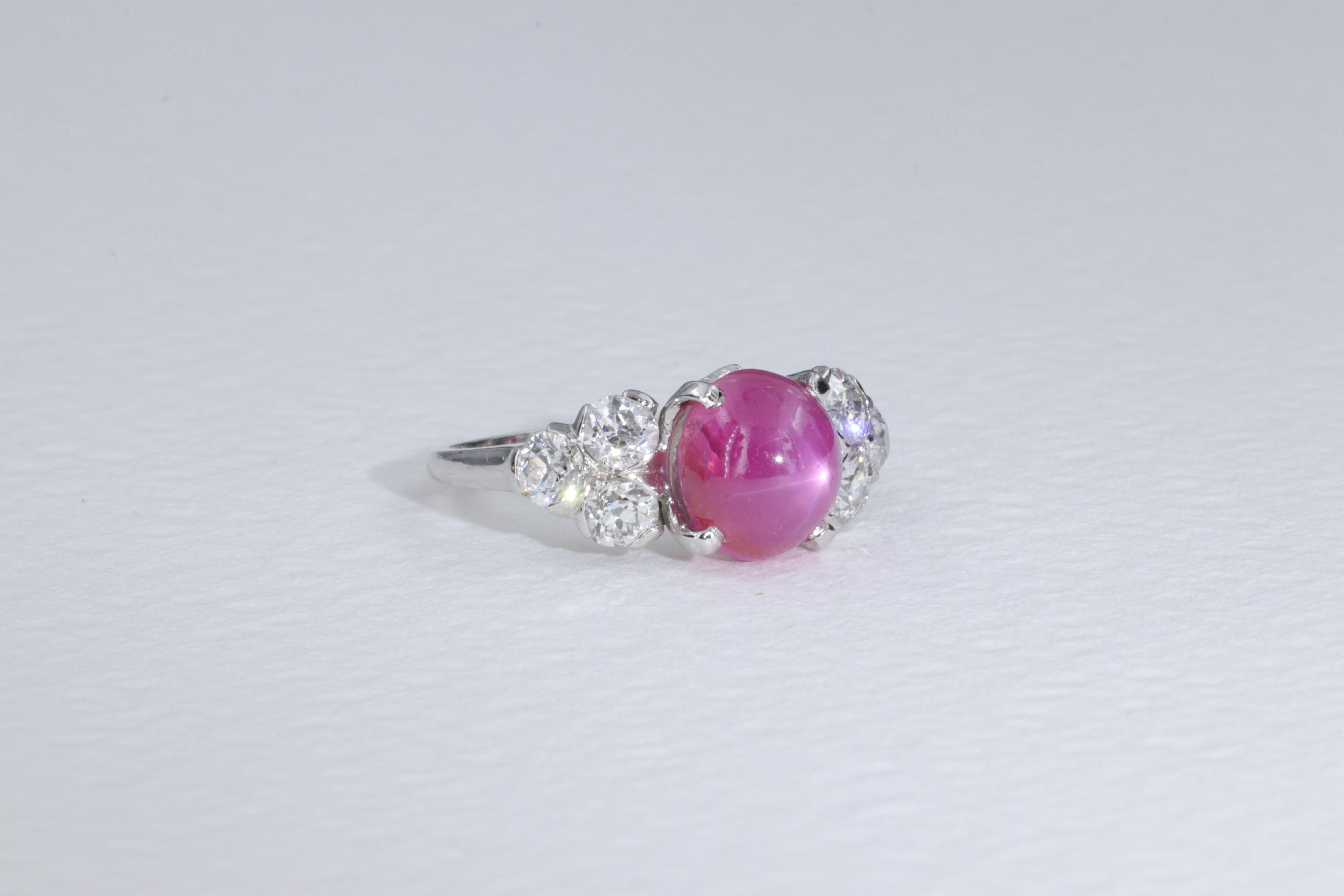 This beautiful Art Deco platinum ring circa 1920 is set with an exceptional no heat ~4.50 carat Pink Star Sapphire that exemplifies extraordinary color, clarity and quality of asterism (star effect). Stones of this caliber coupled with a Burmese